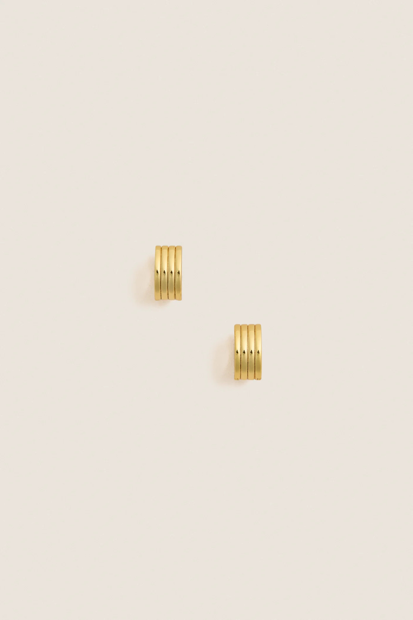 Gold Infinity Huggie Earrings | Tuckernuck (US)