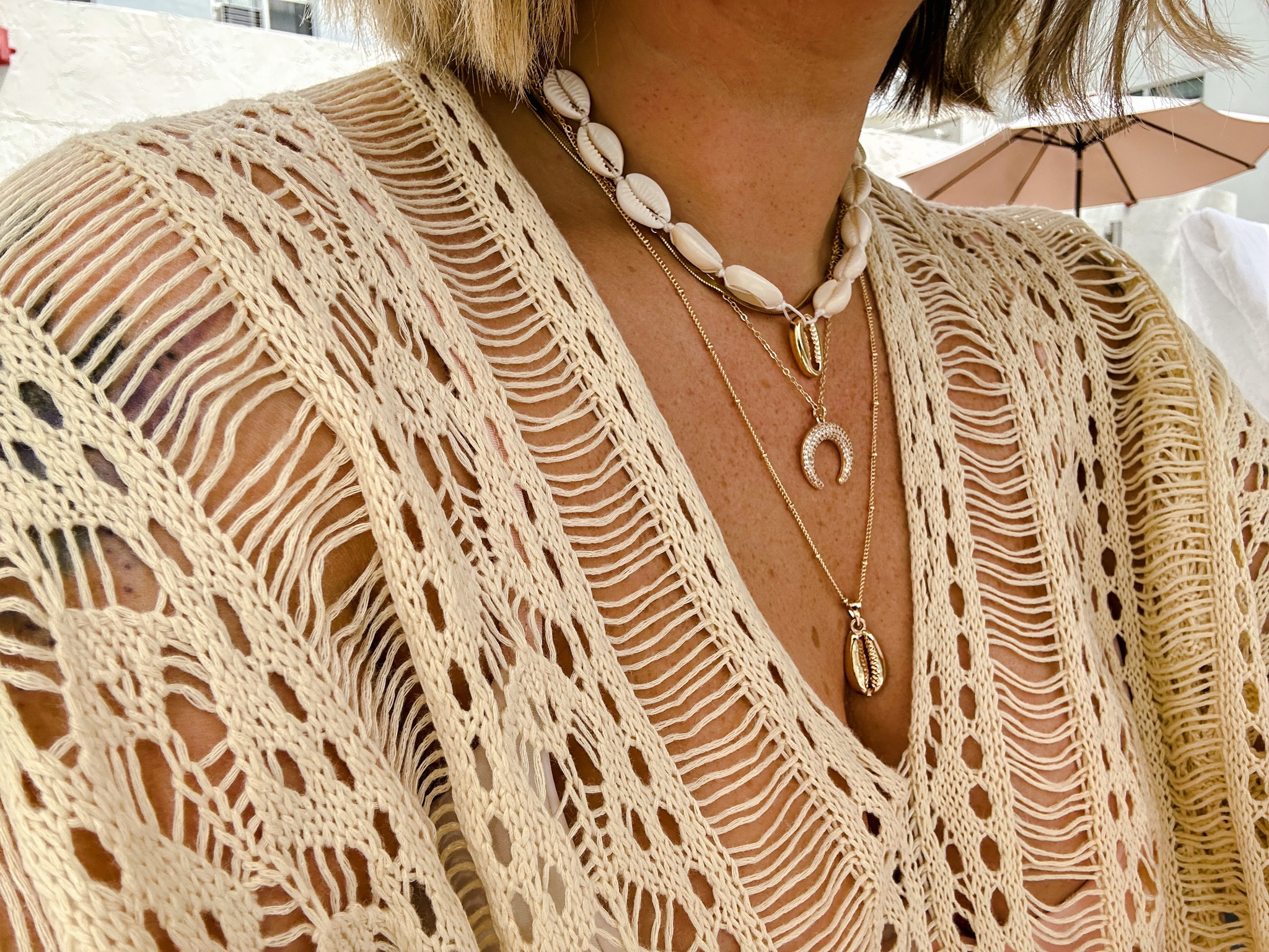Boho crochet beach swim cover up + shell necklace stack. Vacation accessories xoxo

#LTKSeasonal #LTKswim #LTKFind
