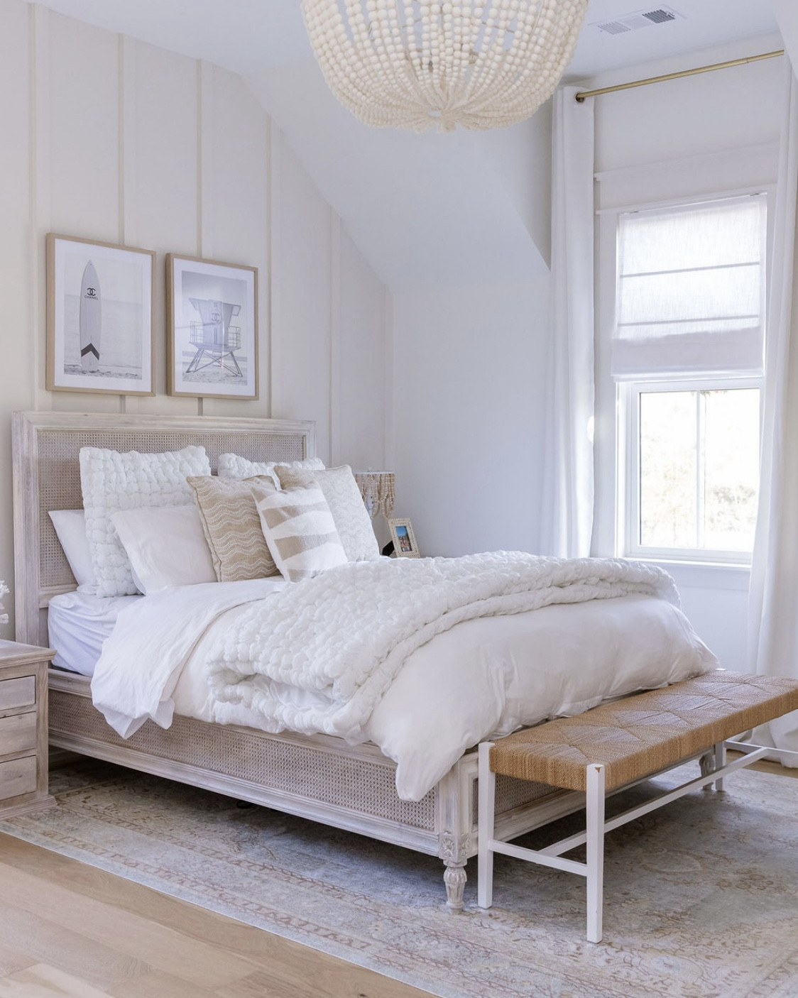 When we bought this house, this room was  drenched in pink. So I lightened it, added wood trim and changed up the color palette to make it a modern coastal room, without being too bench, right on the farm. 

#LTKKids #LTKHome #LTKmomlife