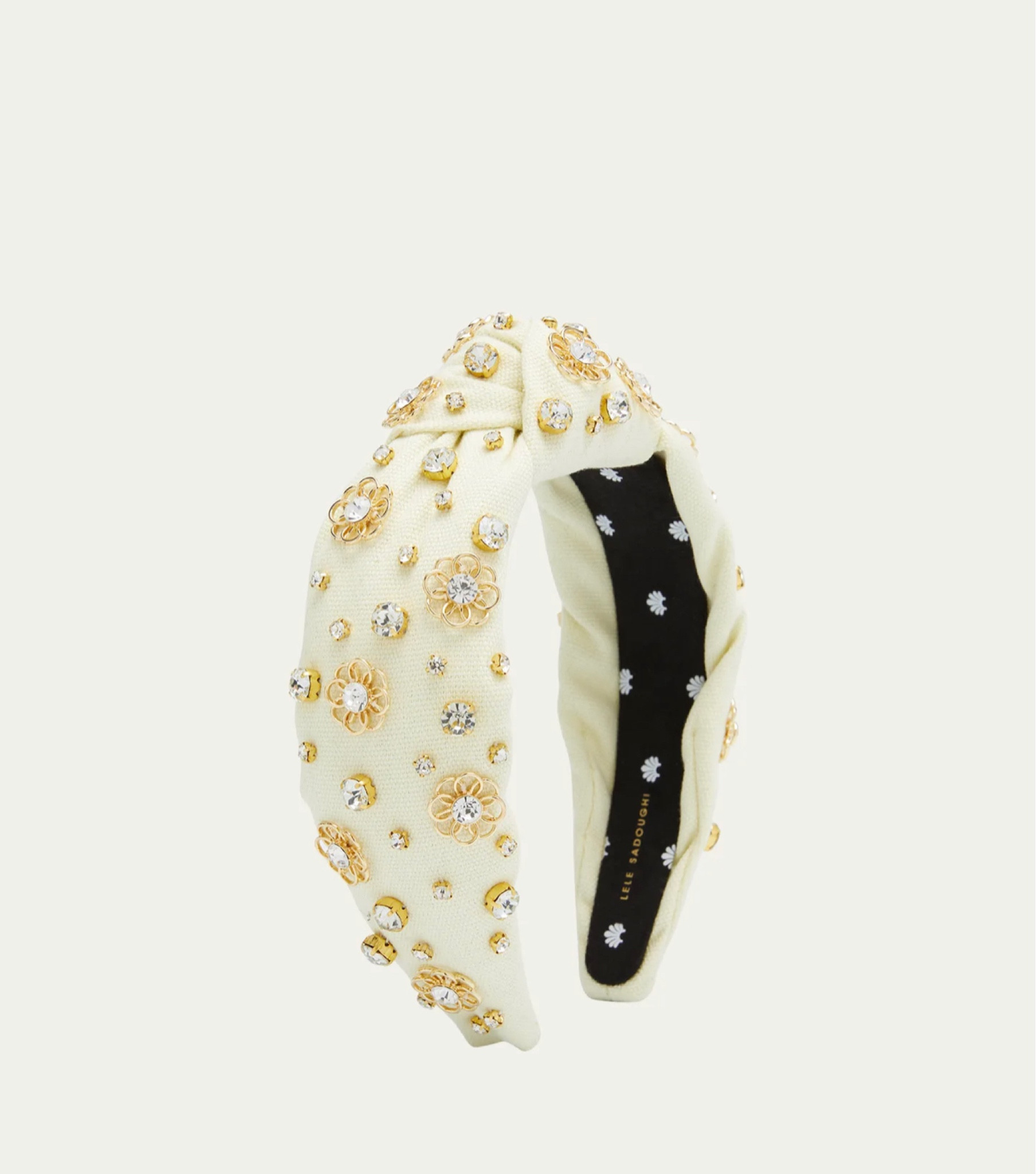 Neutral but super fun headband that will match everything! #lelesadoughi #headband #accessories 

#LTKFind #LTKstyletip