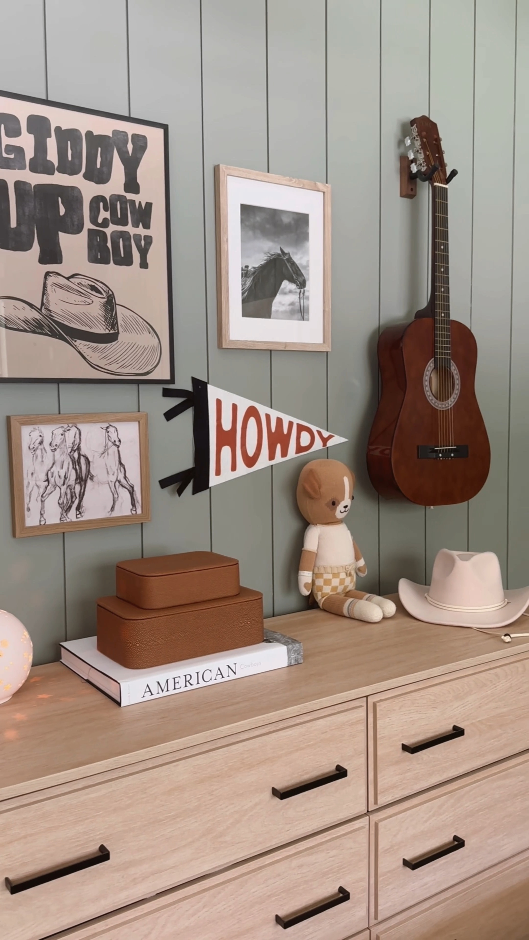 Haven’t shared my sons room in a bit but sharing the links for those who asked on todays reel 🥰 he’s my little country music loving boy 🤎 🤠 🐴 

#westernroom #westernboysroom #boysroom #countryroom #toddlerroom #howdy #horseprint #kidsbed #rattanlightfixture #rug #nightstand #lamp #kidsroom #homedecor 

#LTKKids #LTKFindsUnder50 #LTKHome