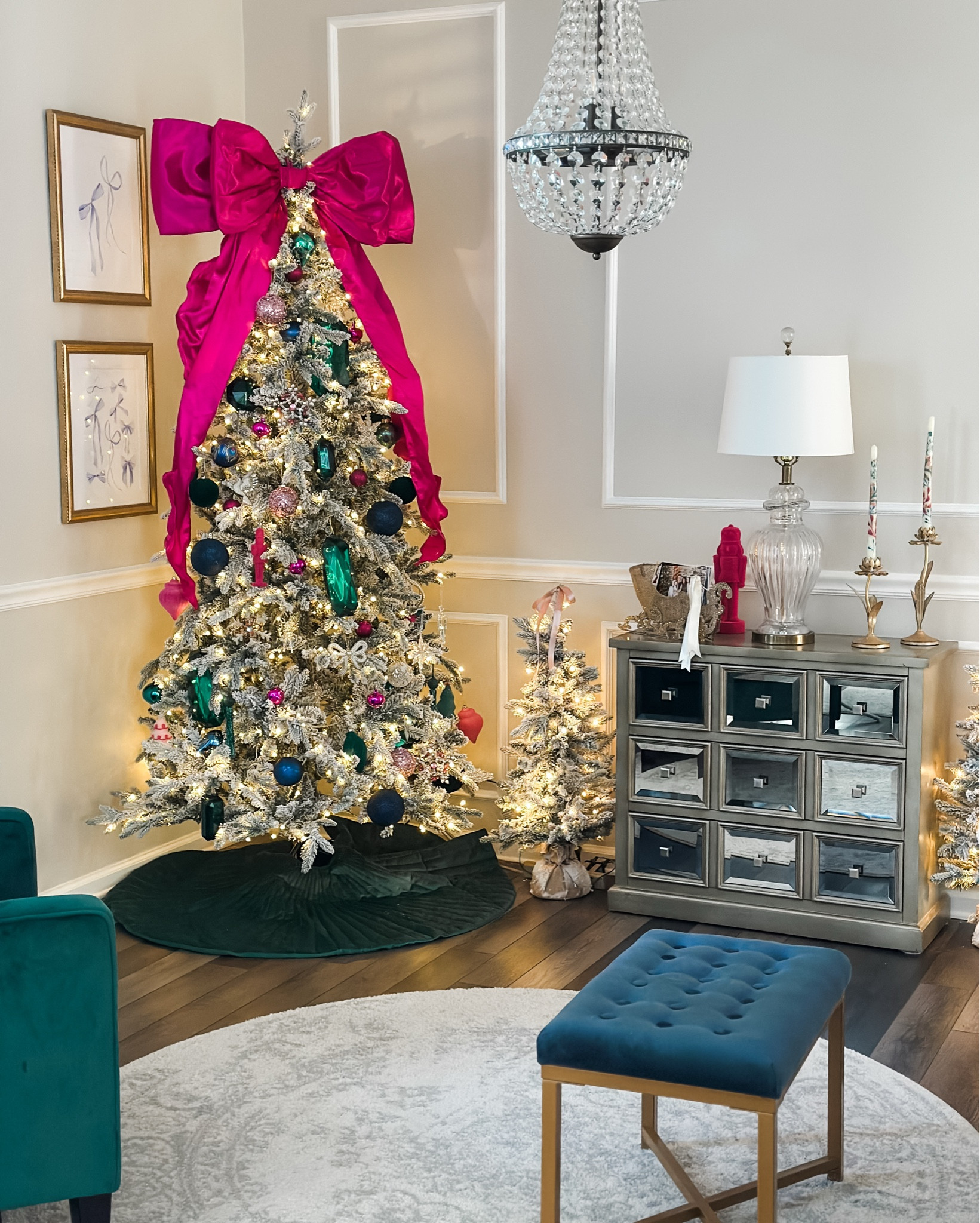 Jewel tones, a hot pink bow, and a toddler who thinks she’s on the décor team. 🫣🎀 Every time I come into this room, the bottom of this tree has a whole new look. Why this tree? No idea — maybe the bright colors are calling her name!

#LTKHoliday #LTKHome