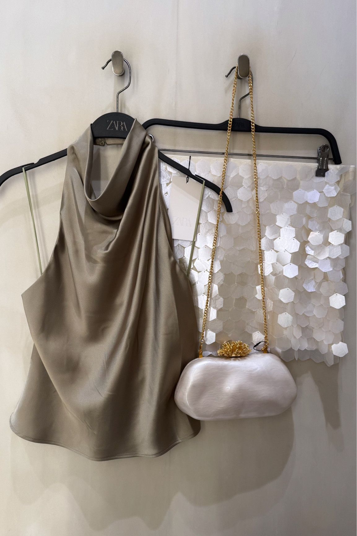 IBIZA INSPO🧚🏼
Tags: new in Zara satin halter neck top backless sequin shimmery top white square detail gold clutch bag gold heels fashion holiday vacation city break party partywear date night girls trip Barcelona Dubai

#LTKstyletip #LTKsummer #LTKpartywear