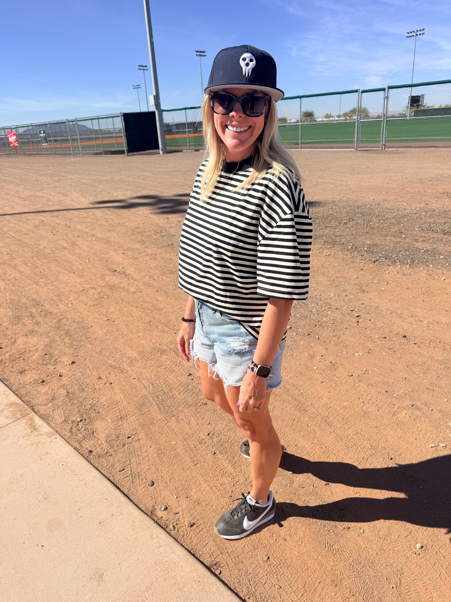 Size XS black and white striped tshirt. Denim shorts and black Nike sneakers 

#LTKOver40 #LTKmomlife #LTKootd