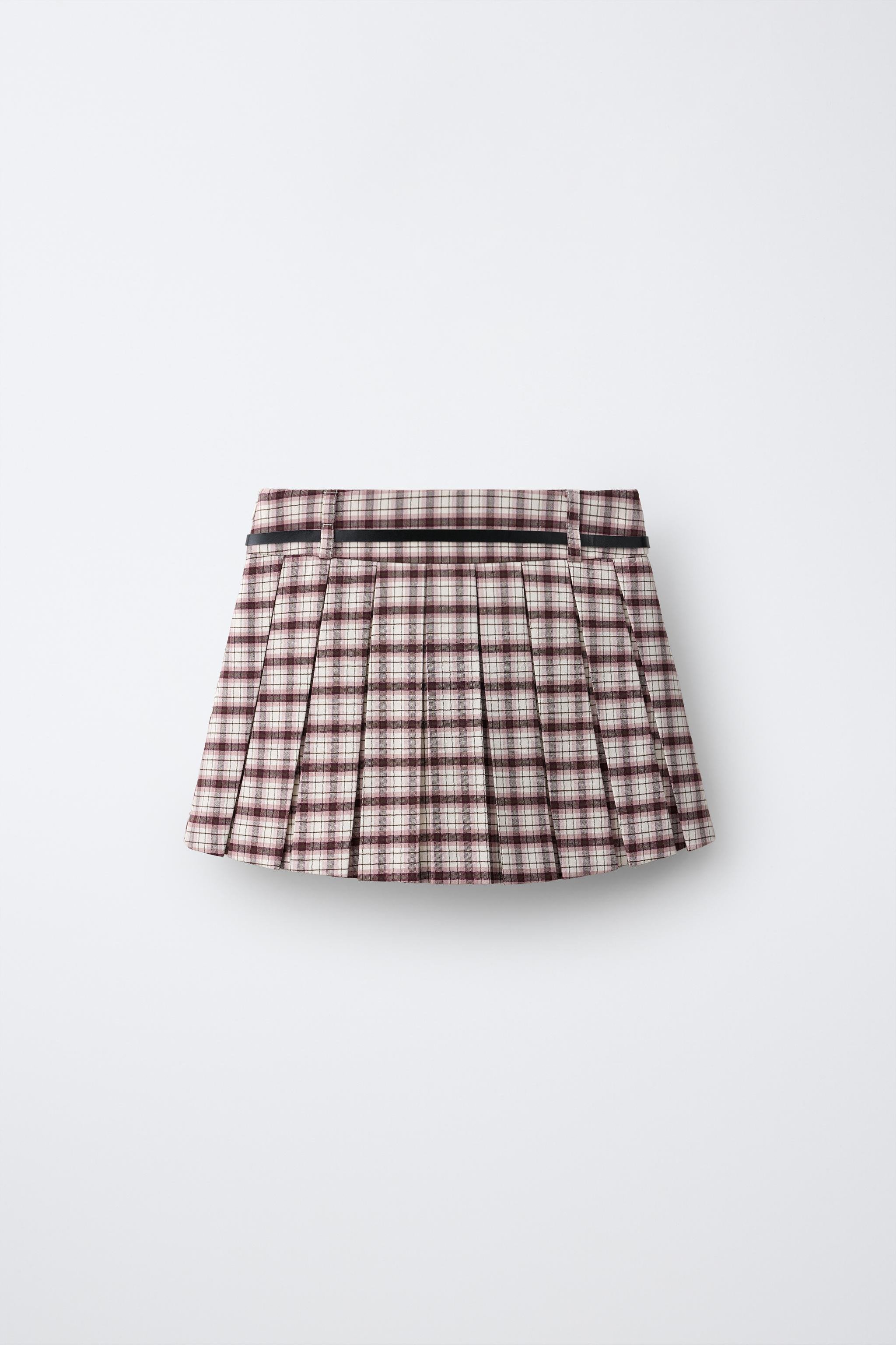 Skirt with interior Bermuda shorts. Hidden side zip closure. Belt appliqu\u00e9. Pleated detail. ... | Zara US