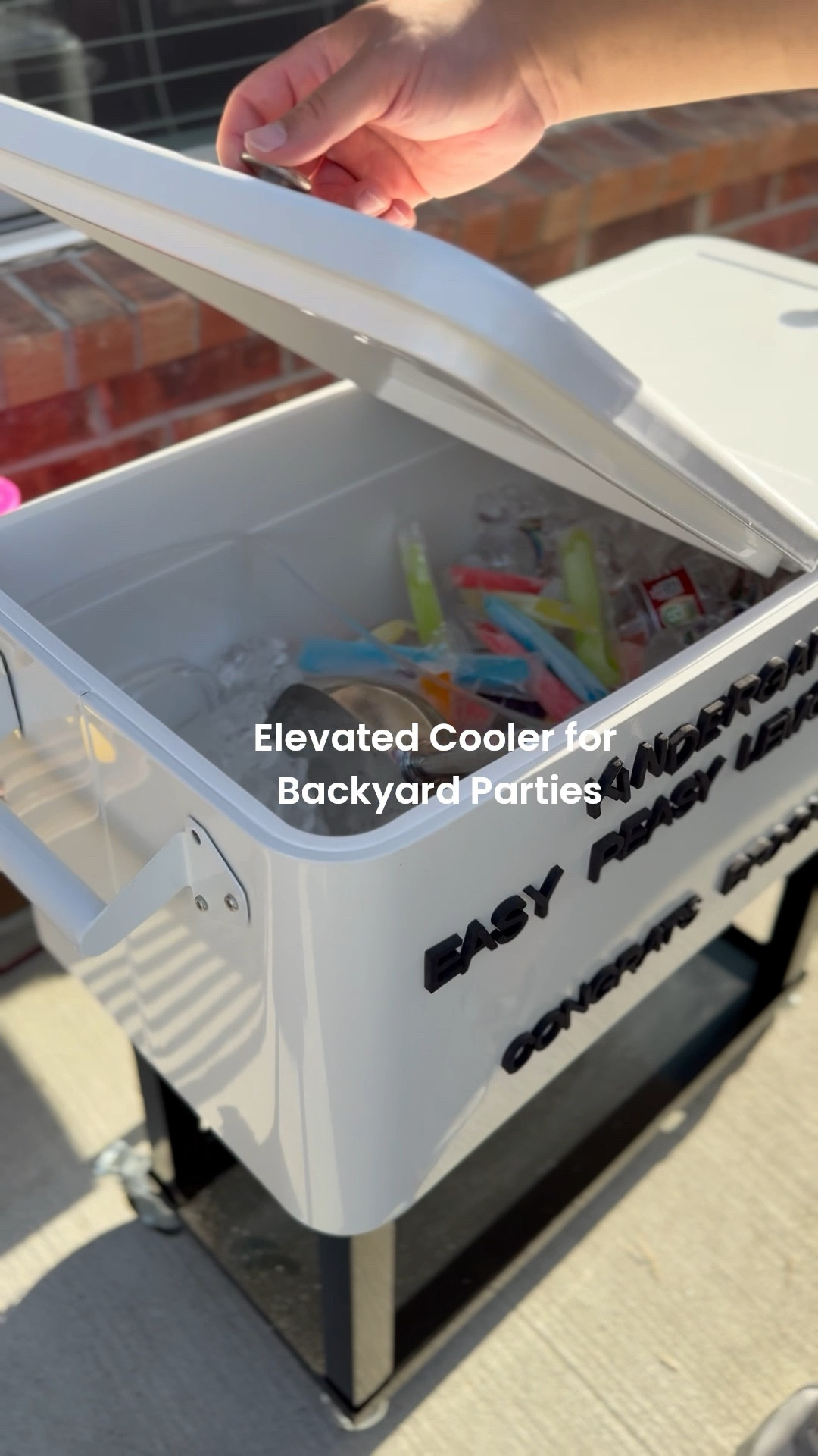 Grab this elevated cooler on wheels, the cooler cover, and magnetic letters you can use to show your drinks menu or any wording of your choice  

#LTKHome #LTKParties #LTKSummerEdit