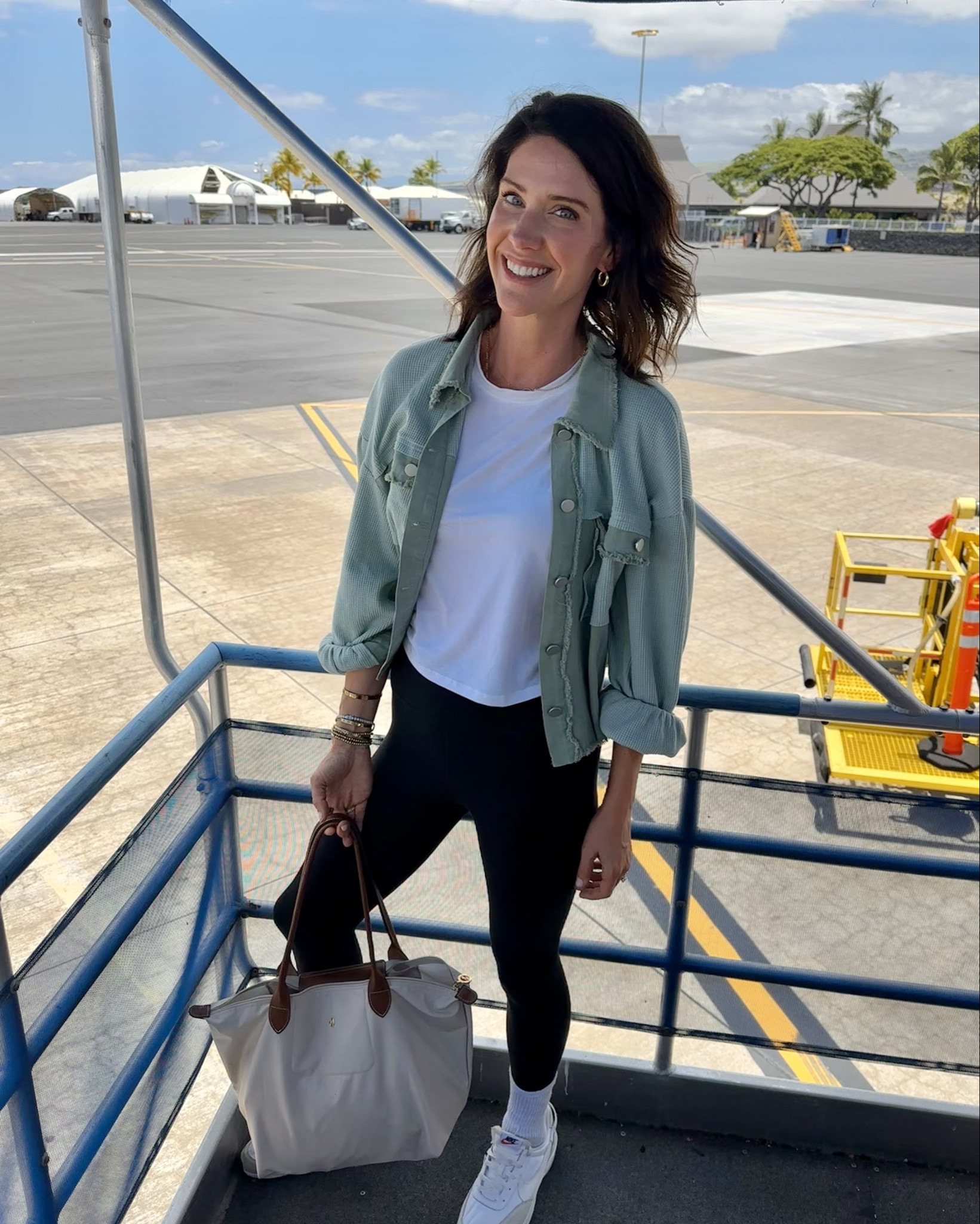 Airport outfit. Wearing a small in the jacket. Comes in a few colors. A small in the boxy cropped tee. And a medium in the leggings  

#LTKItBag #LTKTravel