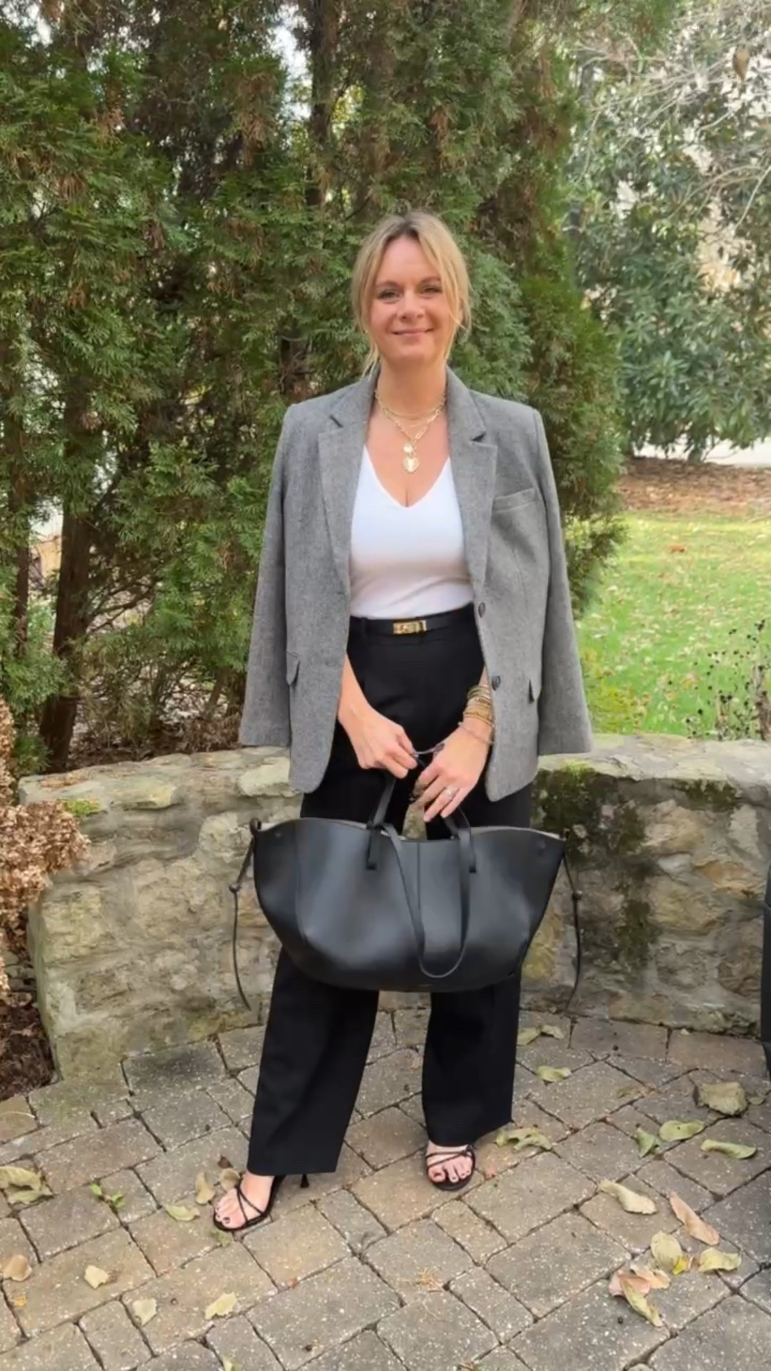 This is one of our favorite ways to style a blazer for work or client meetings because it’s all about the details. A tailored blazer layered over a simple cami and black trousers creates a clean, elevated foundation. But it’s the finishing touches that make the look feel truly polished. A great belt defines the waist and adds structure, while minimal jewelry and classic heels keep things refined. Finished with a sleek black tote bag, the outfit feels intentional, professional, and practical all at once. It’s an easy formula you can rely on when you want to look confident, put together, and still like yourself—without overthinking it.



#LTKdayinmylife #LTKootd #LTKgrwm
