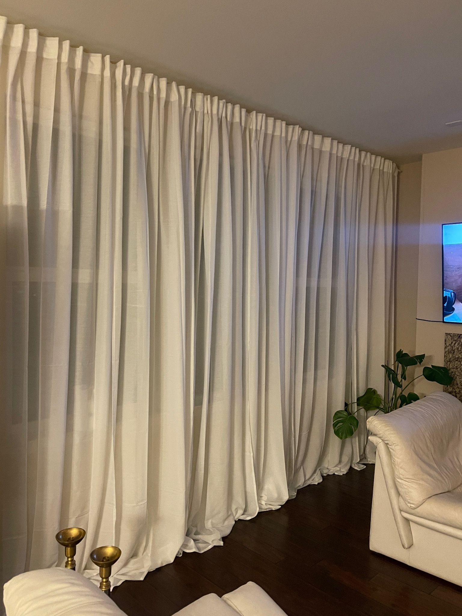 Affordable living room curtains, so airy and beautiful 🪟🛋️☁️🌤️ I used 3 pairs to create this look :) 

#LTKSpringSale #LTKfindsunder100 #LTKVideo