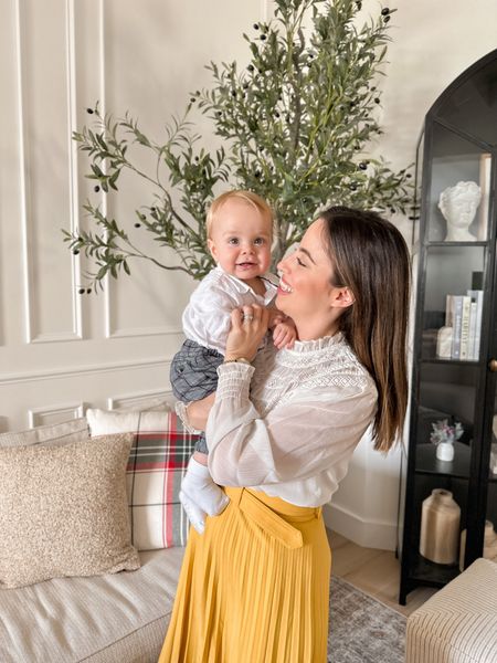 Church outfit idea: yellow pleated midi skirt, white blouse and baby boy outfit with plaid pants, white shirt and brown booties



#LTKbaby #LTKstyletip #LTKkids