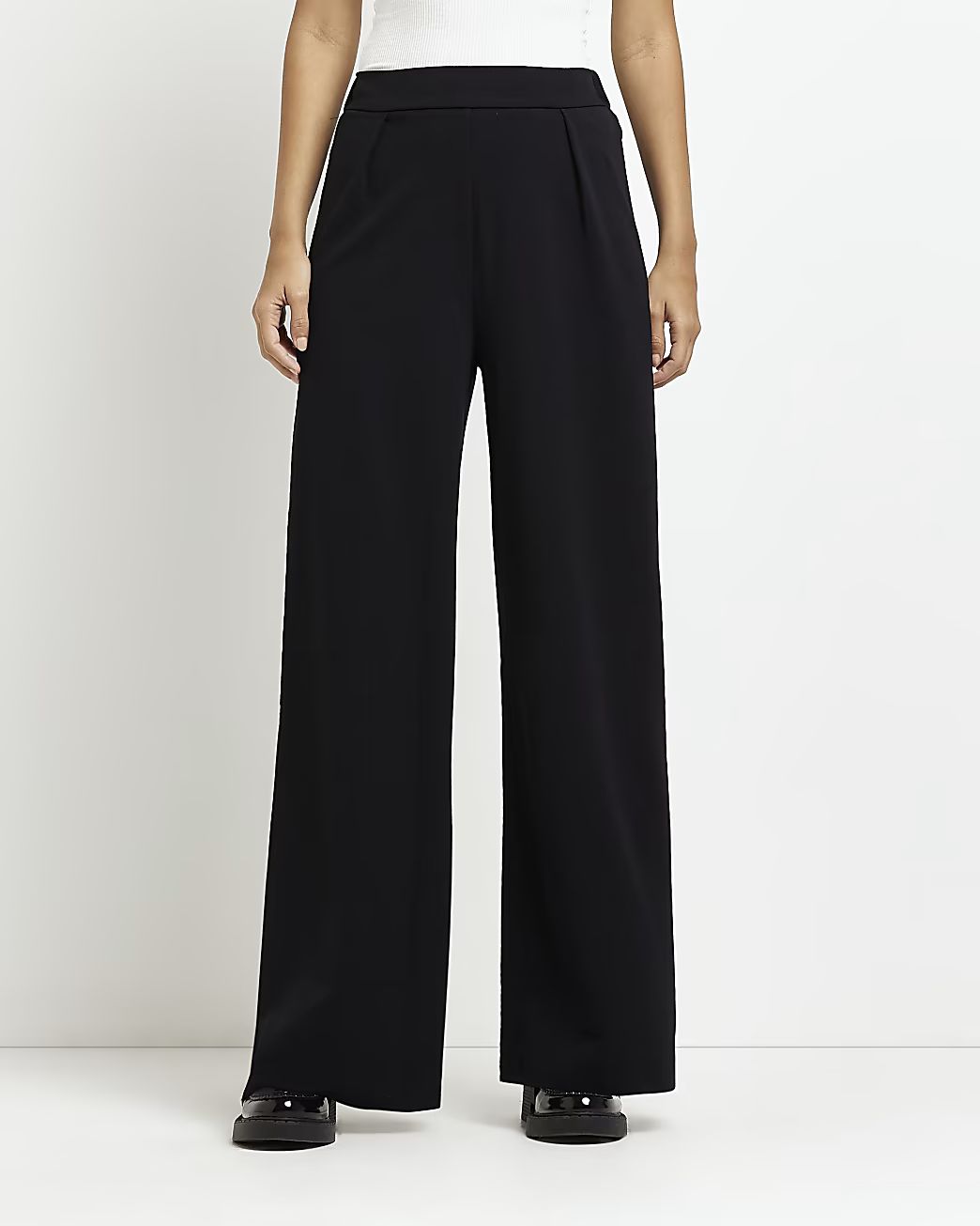 Black high waist wide leg trousers | River Island (UK & IE)