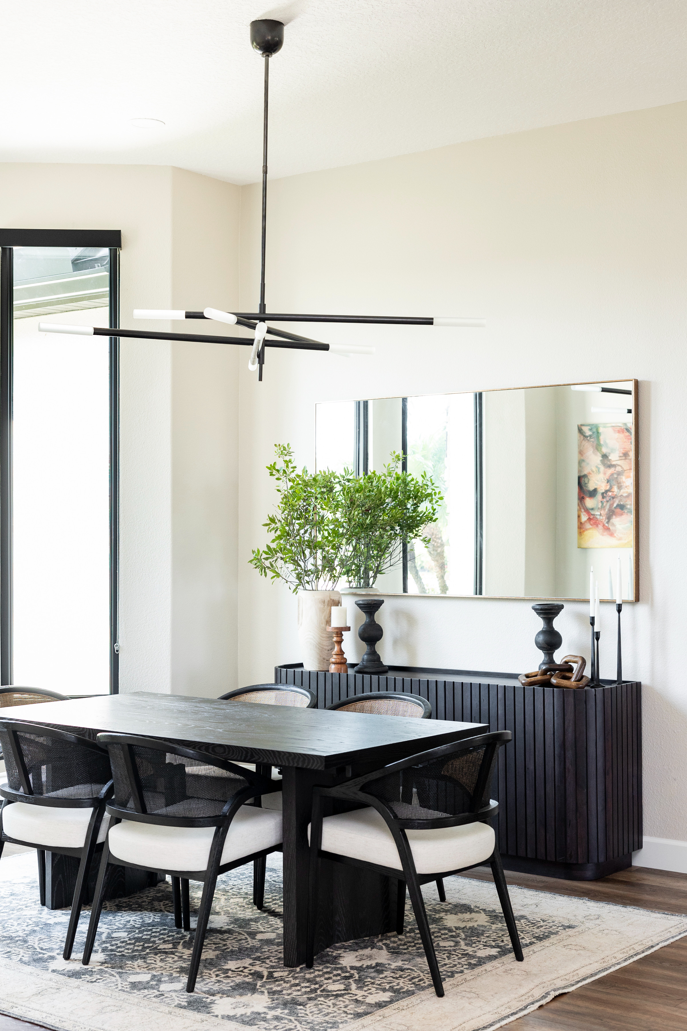 Modern dining room dreams ✨ We designed this space with the goal of capturing clean lines, bold contrast, and carefully curated details. Every piece was chosen to create a modern yet warm and inviting feel. 

 #LTKGiftGuide #LTKHome #LTKStyleTip