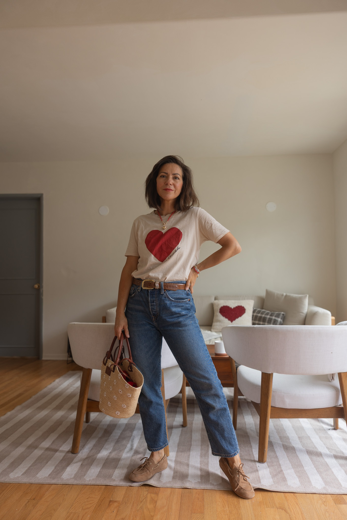 OOTD June 5th 2025

Tee with heart print, cropped blue jeans, Boat shoes and basket bag for a touch of Summer.

Tee and basket bag: Sézane (bag is currently sold out, but you can create an alert on their website) 
Jeans: Levis 501 cropped lightweight 79% Cotton, 21% Lyocell (Lenzing TENCEL™ Lyocell) 
(I buy them all secondhand on various websites like Poshmark and ThredUp (US).
Belt: NaNin Vintage
Boat shoes: Aritzia
Heart Necklace:  Roxanne Assoulin
Red cardigan: Reformation

 

 

#LTKsummer #LTKstyletip #LTKpetite