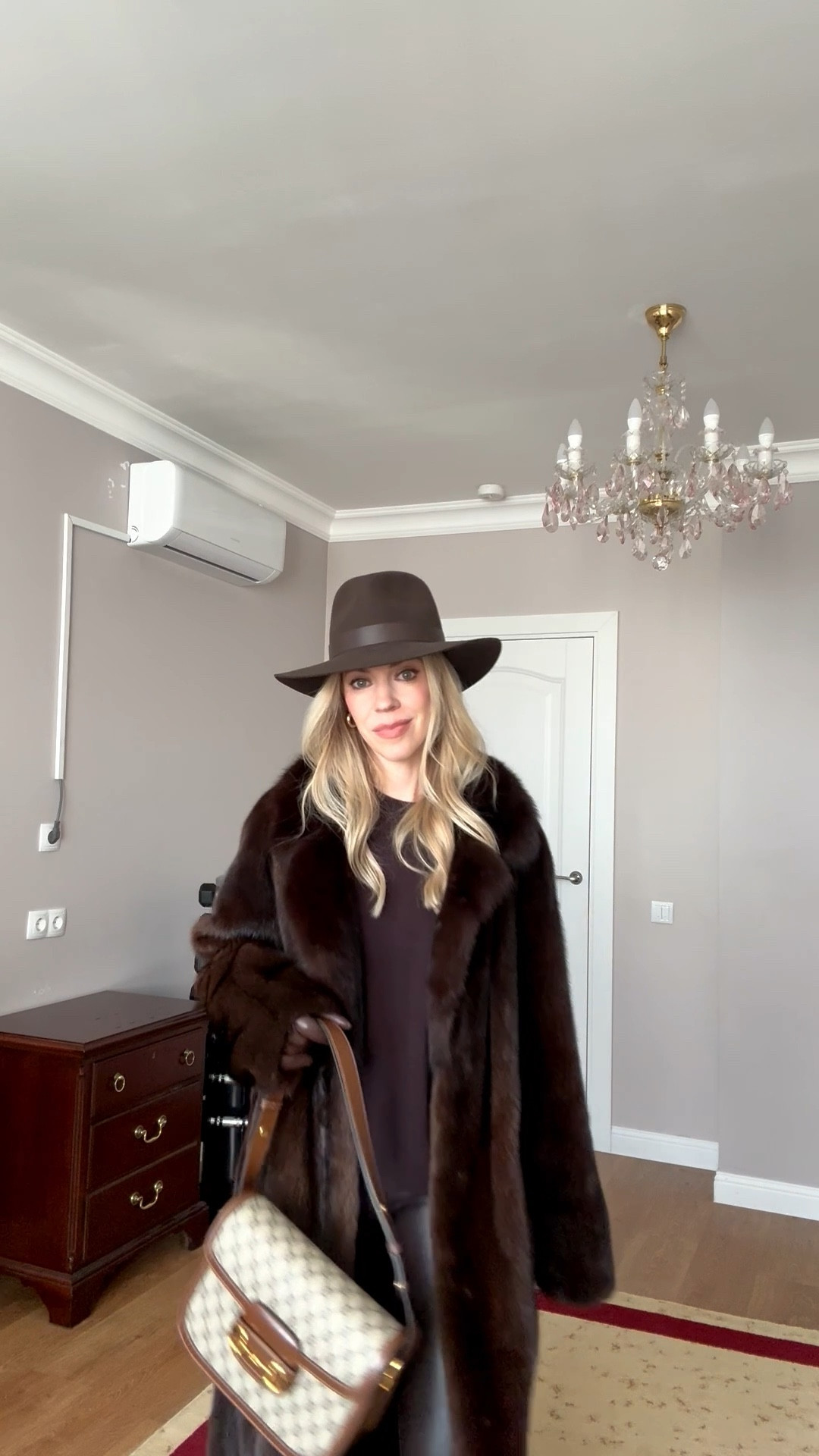 Chocolate brown outfit idea, fur coat outfit, faux leather leggings, @Janessa Leone dark brown wool hats, lug sole riding boots, Gucci bag 

#LTKOver40 #LTKootd #LTKSeasonal
