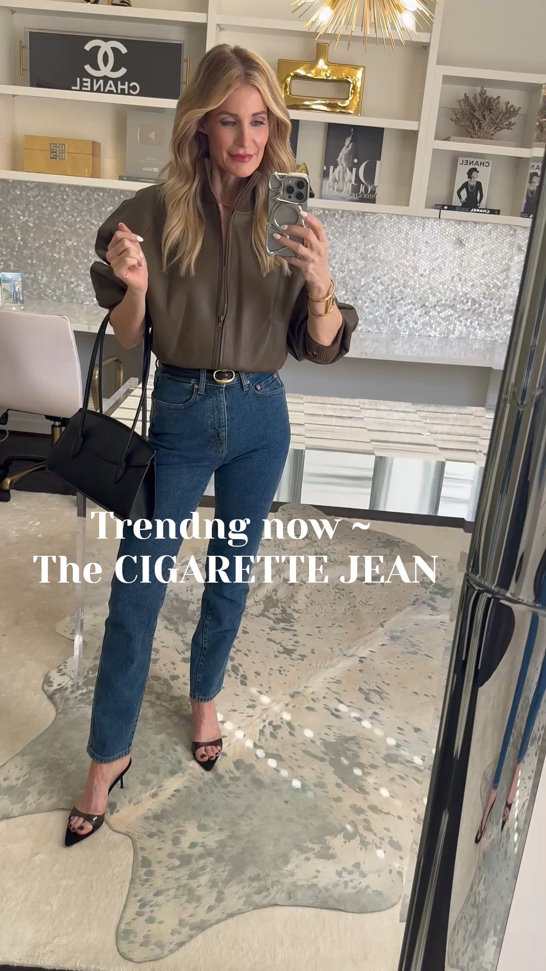 The bomber jacket trend is still going strong, and this vegan leather version is such a chic, wearable way to try it. I love zipping it halfway and tucking it under for a slightly cropped fit — it defines your waist and gives that effortless, cool-girl shape. The Dolman sleeves add structure without bulk, which makes the whole look feel modern and flattering. I paired it with these insanely slimming cigarette jeans in a dark wash — the fit is incredible and the back pockets are perfectly placed to lift and shape. This is one of those outfits that instantly makes you look polished, streamlined, and put together. Wearing XS in the bomber jacket and 24 in the jeans. ✨ 

  

#LTKgrwm #LTKootd #LTKOver40 #LTKgrwm #LTKootd #LTKOver40