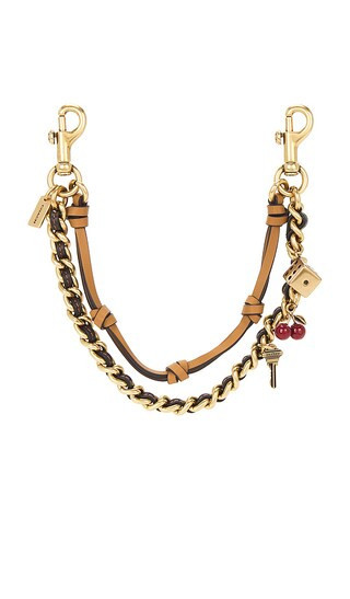 Coach Leather And Metal Swag Bag Charm in Metallic Gold. | Revolve Clothing (Global)