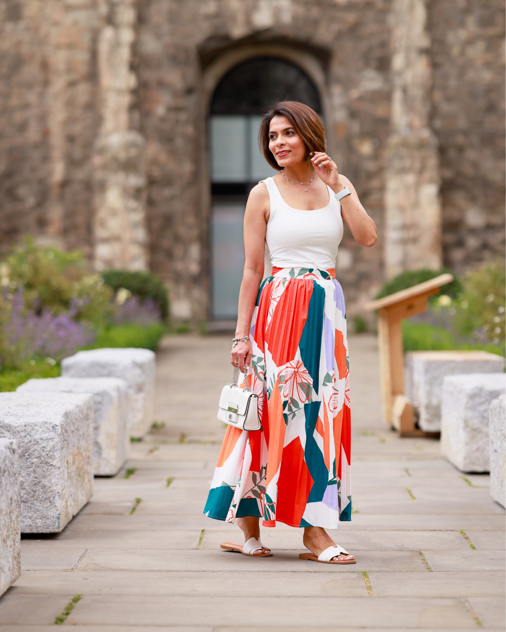 White Vest Sunny Oasis Pleated Maxi Skirt White Mini Bag White Slides Summer Outfit Holidays Look

#LTKstyletip #LTKtravel #LTKeurope