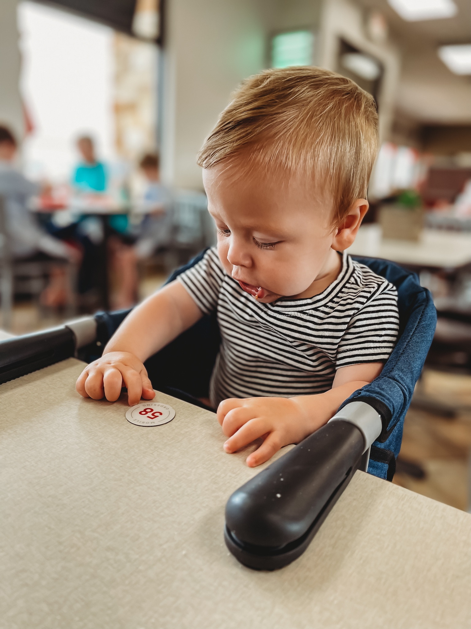 Hook on high chair. So easy to use and he loves it!

#LTKbaby #LTKkids #LTKfamily