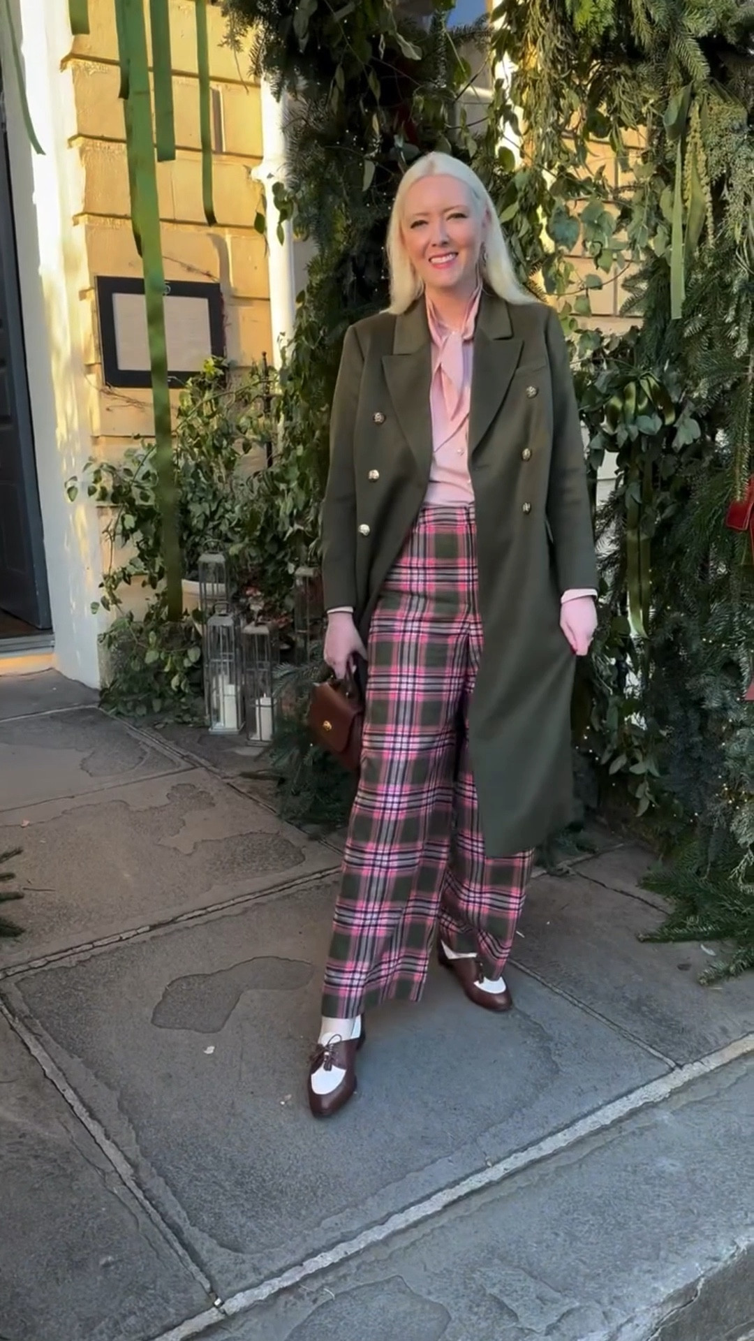 Don’t think festive fashion always has to be red! Channel those Wes Anderson vibes with LK Bennett’s Natalia green wool coat (also available in petite) and pink tie neck Hall blouse - perfect with Boden’s head turning Belgravia pink and green wool check trousers! 

#LTKwinter #LTKfestive #LTKuk