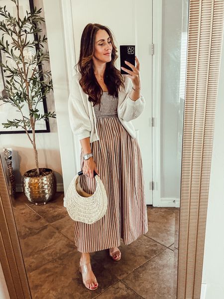 Striped Spring maxi dress (wearing size small) smocked top, spaghetti strap, brown & white stripe detail dress with pockets 🤎🤍 

Spring dress, Easter dress, vacation dress, Amazon dress, Amazon fashion 

#LTKfindsunder50 #LTKsalealert #LTKstyletip