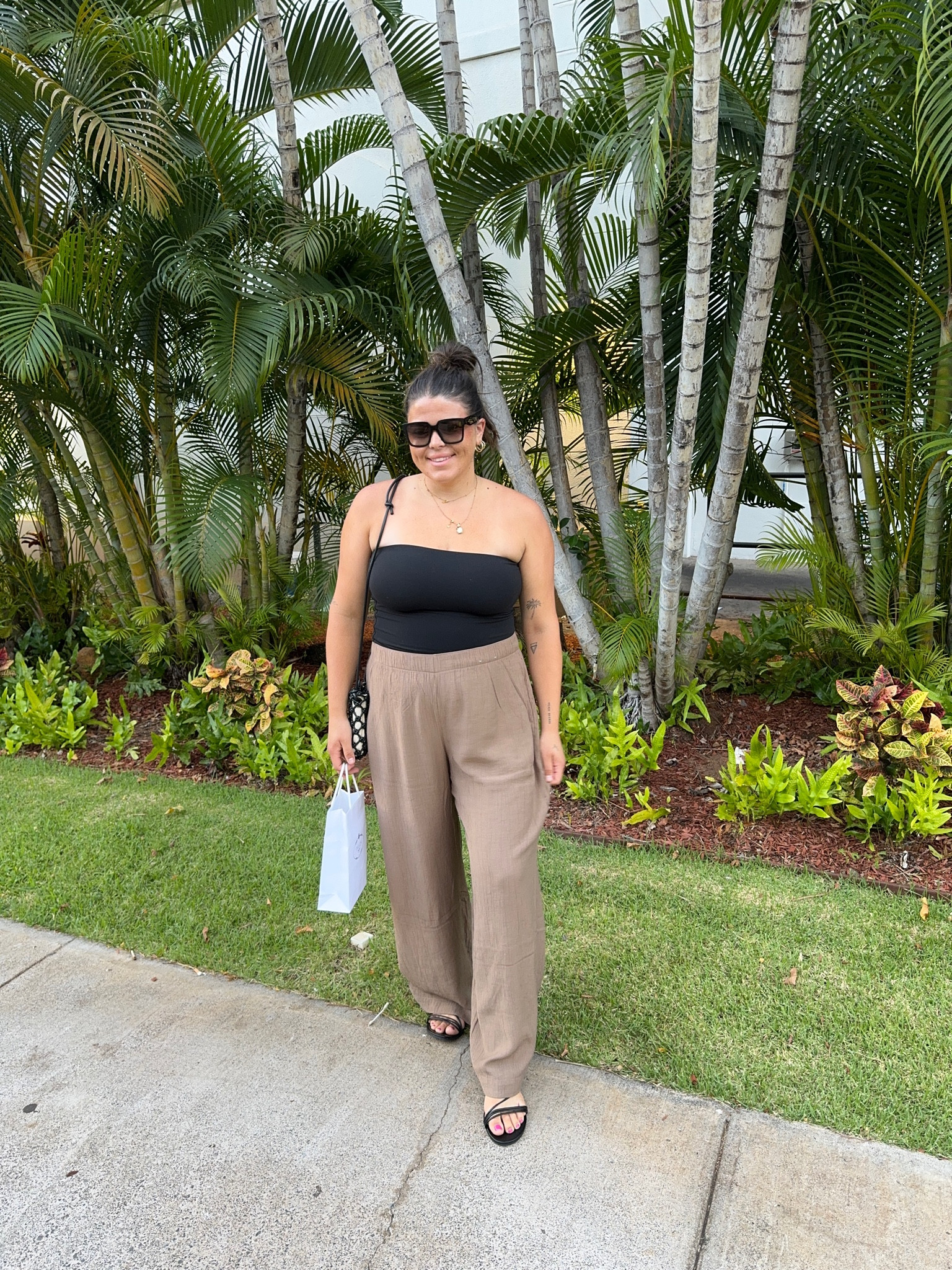 What I wore in Hawaii, I love these crinkle wide leg pants from Abercrombie! I got size Large Long (I am 5’7) and size xl in the double lined strapless top!! Shoes are strappy sandals from Amazon. Felt so cute 🥹

Vacation outfit, midsize outfit, beach outfit, cruise outfit, European vacation, Hawaii outfit 

#LTKTravel #LTKFindsUnder50 #LTKMidsize