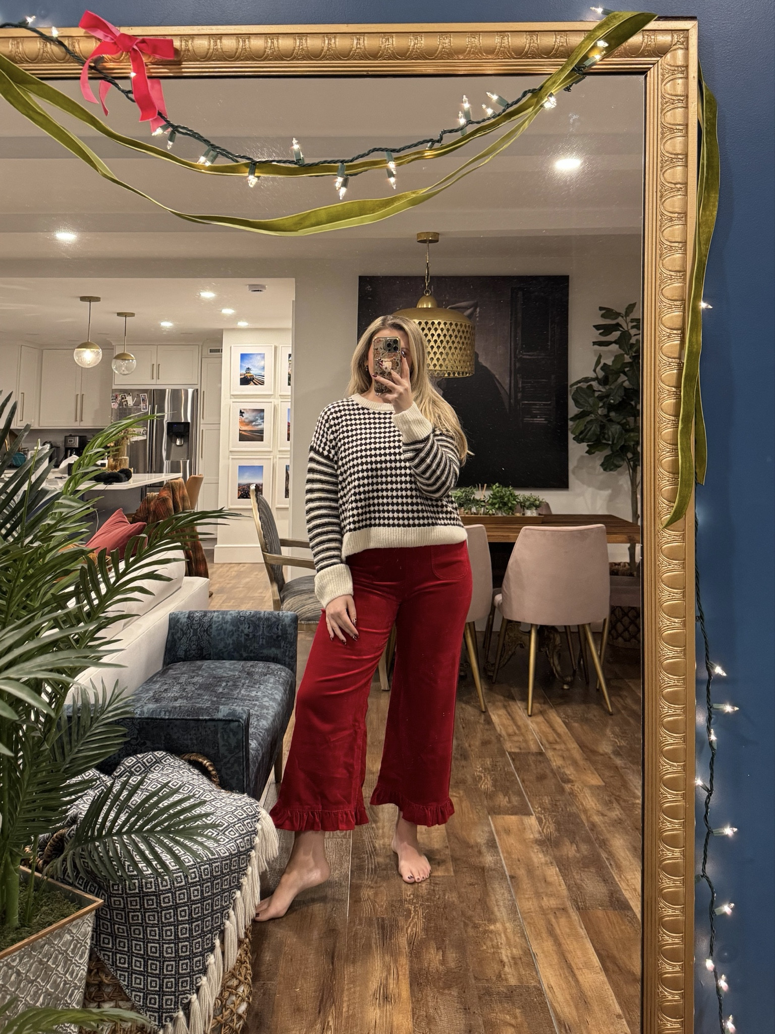 Black and white cozy sweater, wearing a large. Red velvet colette pants, true to size. Love the ruffle on the bottom, perfect for christmas! Christmas party outfit. 

 

#LTKHoliday #LTKootd #LTKMidsize