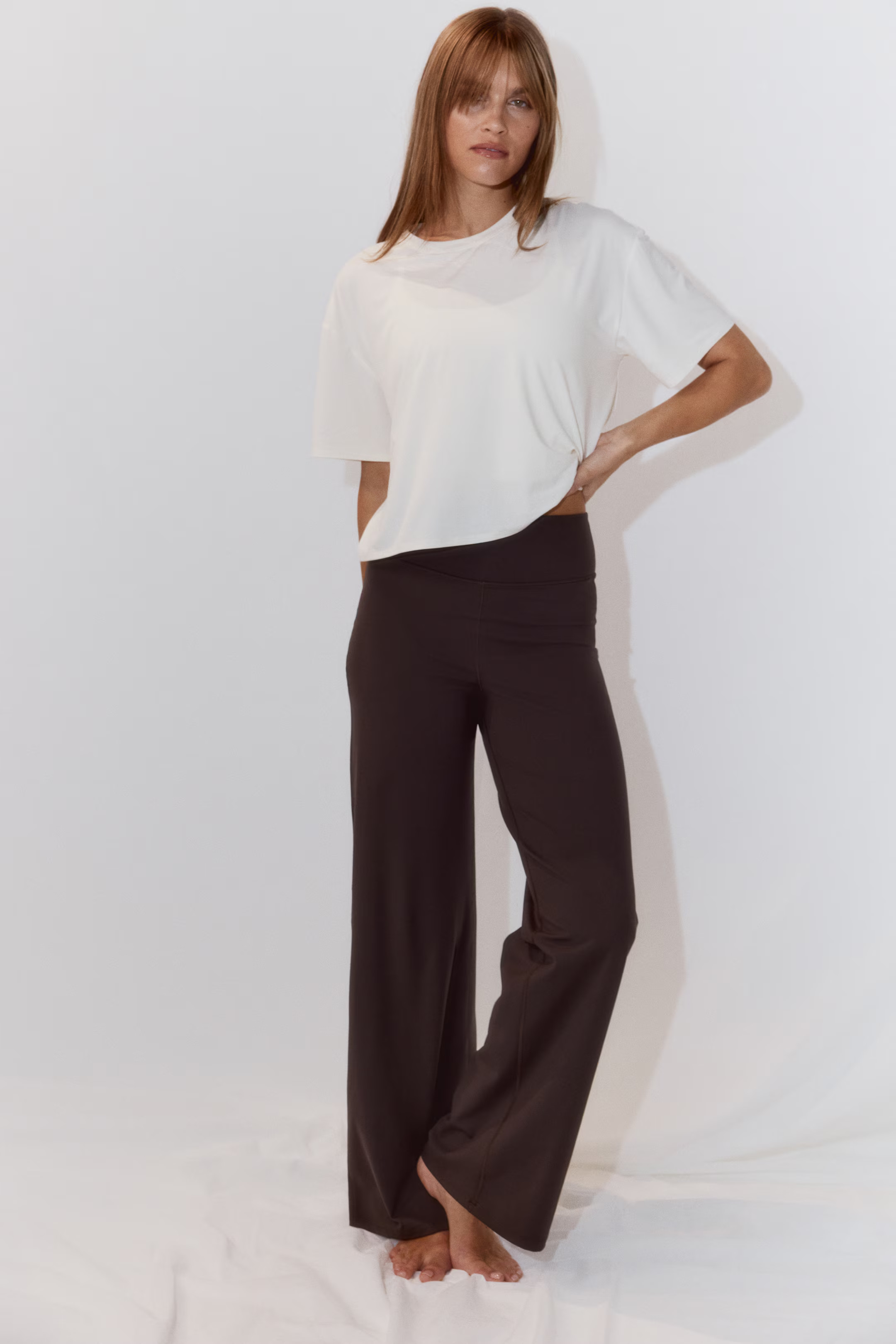 Wide sports trousers with SoftMove™ | H&M (UK, MY, IN, SG, PH, TW, HK)