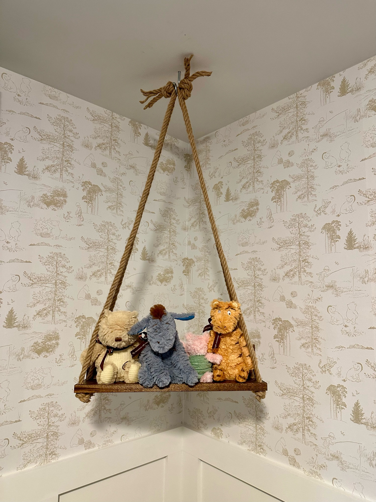 DIY stuffed animal swing in Winnie the Pooh nursery

#LTKfamily #LTKbaby #LTKhome