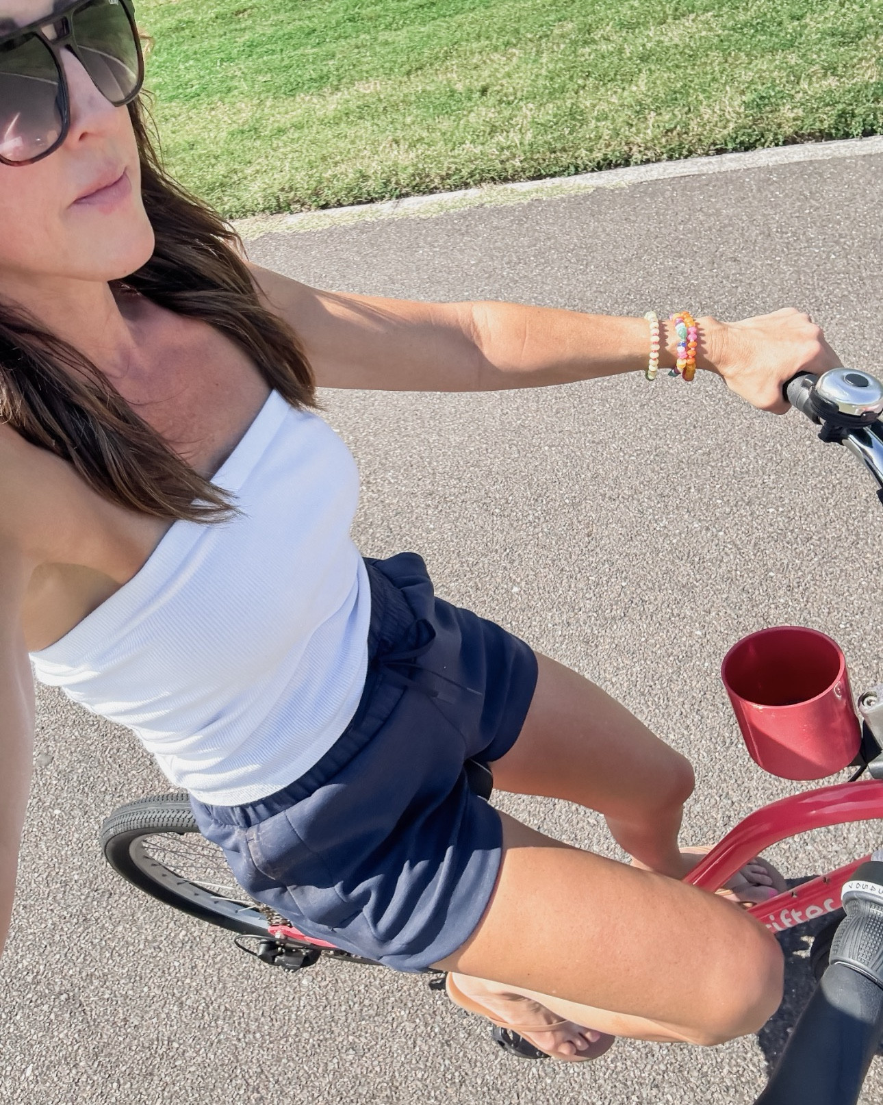I love a bike ride. Athletic ootd. 
Small tube top & small shorts 
Vacation style. Athleisure. Mom style 

#LTKgrwm #LTKmomlife #LTKSeasonal