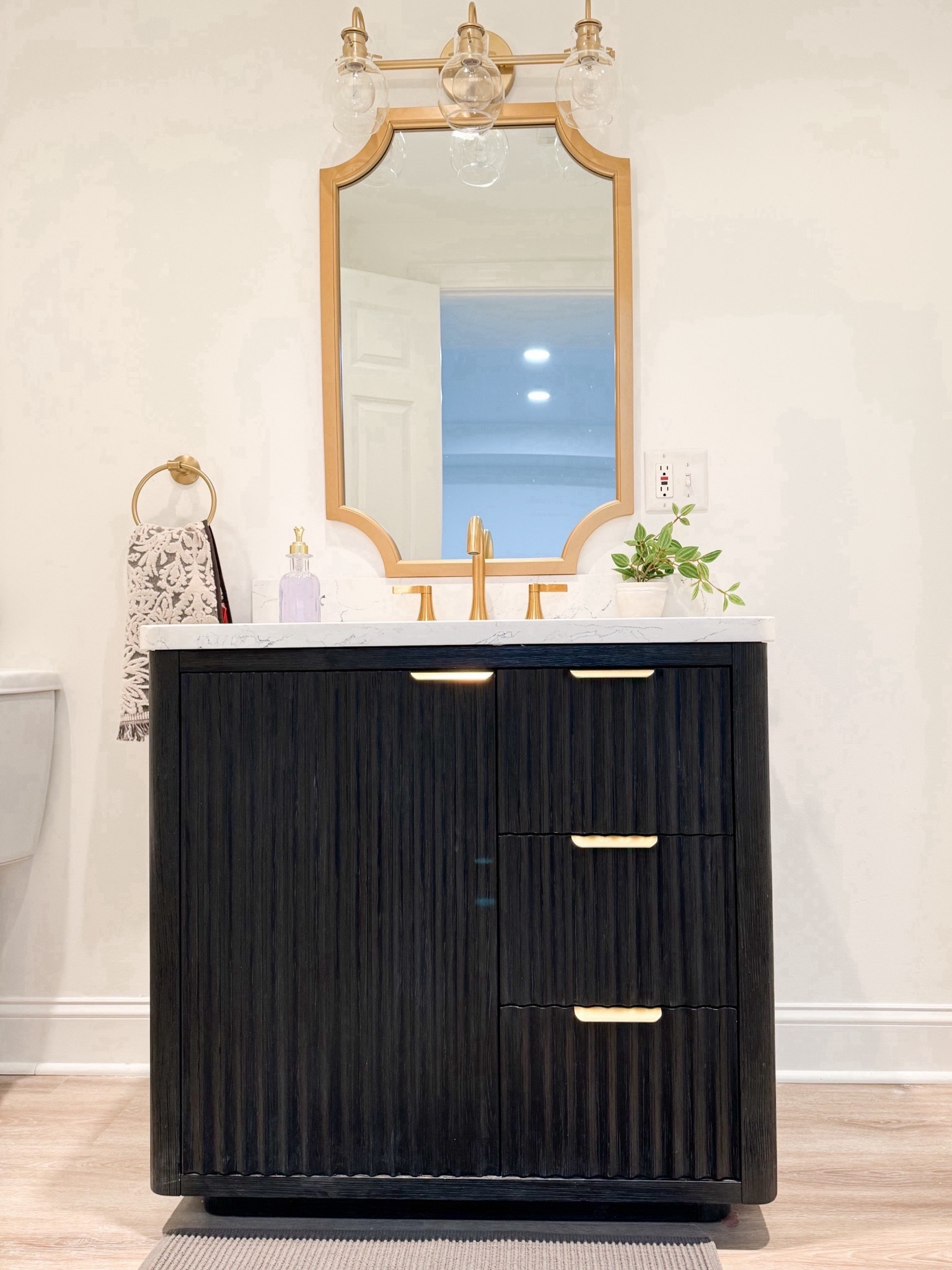 Dark bathroom vanity, hold mirror, hold light fixture, bathroom hardware 

#LTKhome