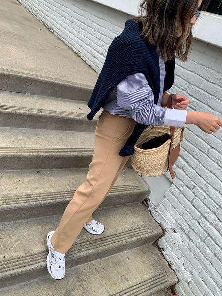 How to wear trousers with sneakers. Transitional dressing 

Shirt - J.crew. Sized up to a 4
Sweater - Jenni Kayne xs
Trousers - J.crew petite 0
Sneakers - New Balance 36 
Tote - Loewe 