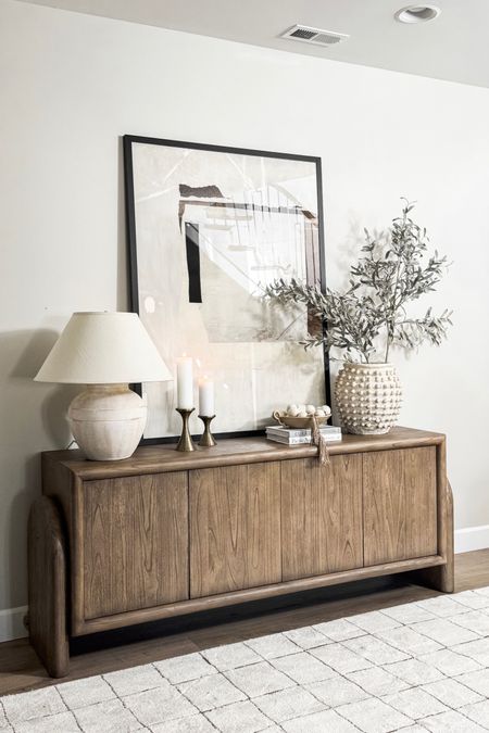 What is your favorite piece from my recent console styling? I can't decide!

Home  Home decor  Home favorites  Neutral decor  Modern home  Console styling  Wall art  Abstract  Lighting  Textured vase  Faux greenery  Candles  Coffee table books

#LTKhome #LTKSeasonal