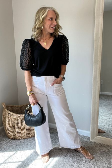 Love black and white 
Wearing XS top…look at those beautiful sleeves 🥰
Use code LISA10
White jeans wearing a 6 but have good stretch so I’d try a 4 

#LTKover40 #LTKstyletip #LTKfindsunder100
