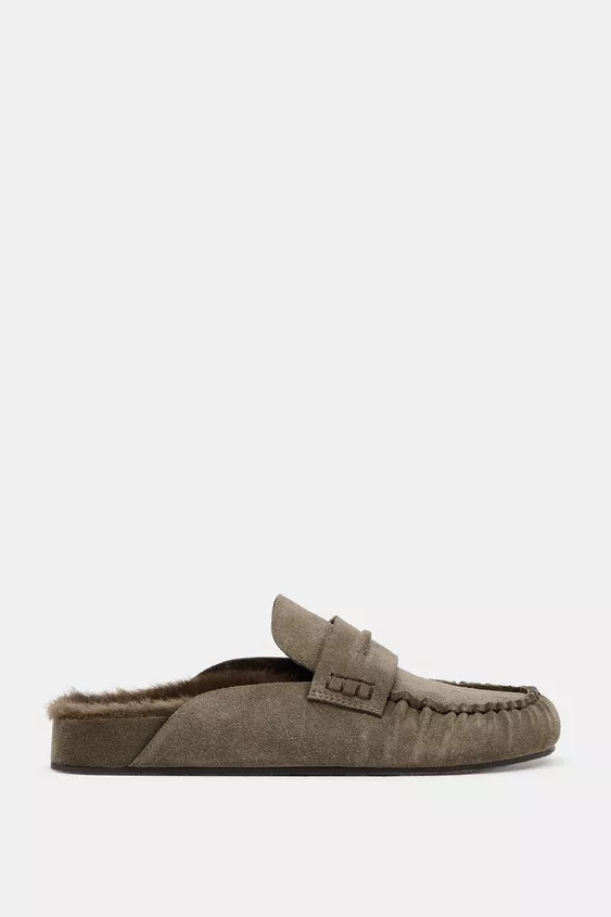 Leather mule clogs. Loafer style. Raised vamp and penny strap at front. Faux fur interior. Rounde... | Zara US