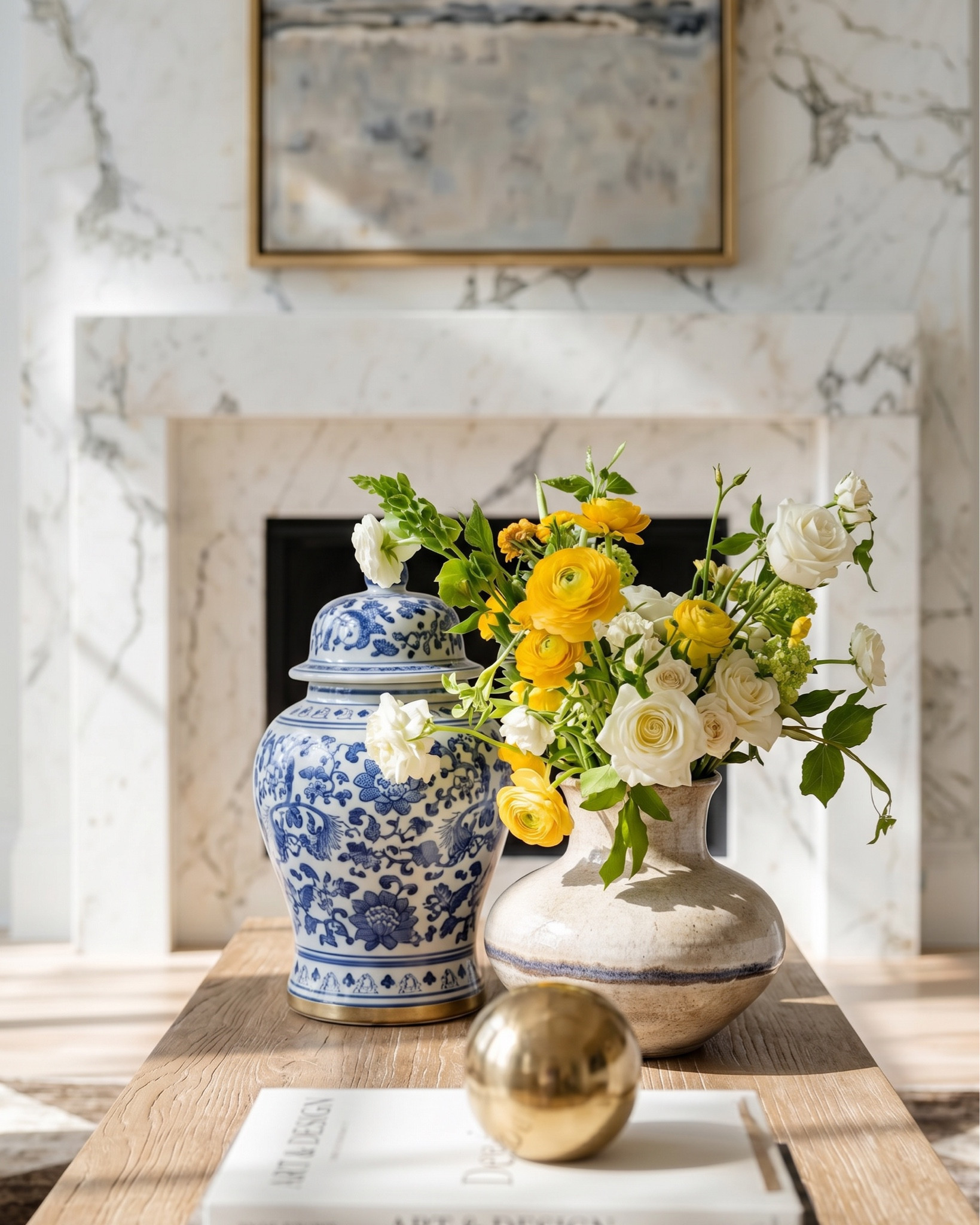 • White upholstered sofa (modern clean lines)
• Light wood frame accent chair (neutral cushion)
• Chunky knit throw blanket (cream / beige)
• Light wood rectangular coffee table (minimal / modern)
• Neutral checkered area rug (brown / cream pattern)
• Marble fireplace surround (white with gray veining)
• Large abstract landscape wall art (neutral tones, gold frame)
• Built-in shelving (painted soft gray)
• Decorative books (neutral stacked styling)
• Small ceramic decor objects (matte black / stone finish)
• Brass candle holders (modern minimal)
• Glass decorative vases (clear / smoked)
• Wood ceiling beams (light natural finish)
• Round flush mount ceiling light (white globe)
• Ceramic vase (rounded neutral tone) • Fresh floral arrangement (yellow + white flowers) • Decorative tray (light wood or stone) • Stacked coffee table books (neutral covers) • Small brass sphere decor object
• Light wood side table (open shelf design) • Blue and white ceramic ginger jar • White table lamp (fabric shade, brass detail)
• Light wood sideboard cabinet (cane / woven door fronts) • Cane panel credenza (natural oak finish) • Blue and white ceramic ginger jars (traditional style) • White ceramic bowl (centerpiece decor) • Brass decorative tray (organic shape) • Floral still life wall art (gold frame) • Neutral floral wallpaper (textured / vintage style) • Brass wall sconces with white glass shades • White table lamp with brass hardware • Large ceramic table lamp base (blue/white pattern)


#LTKHome #LTKSaleAlert