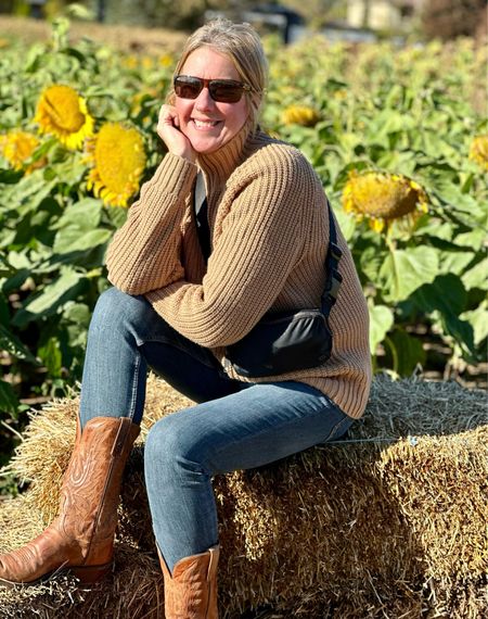 A few people have asked me about my sweater and my boots 😊

The sweater is couple years old from HM 
The boots were purchased in Innisfil Ontario   At a place called Herbert’s

The bag is a small lululemon over the shoulder belt bag with adjustable strap . 

Sunnies are tan Maui Jim’s 

Yesterday was the perfect day to visit an apple orchard and pick some apples .   They had a great selection . I picked some empire and some Courtlands 

The orchard also had a sunflower field 
A corn maze .  A wagon ride .  
You could pick pumpkins and gourds 
There was still raspberries for picking too !  

I also got a jug of fresh apple cider

There was a lovely area with colorful picnic tables where you could sit and enjoy a drink or food .

Happy new week  !

Sweater @hm
Sunnies @mauijim
Jeans @zara
Cowgirl boots @herberts ( innisfil)

#sunflowerlove
#autumn
#fall
#cowgirl
#cowboyboots
#alittlebitcountry
#sunnydayfun
#oppleorchard
#lateoctober
#farmfun


#LTKSeasonal