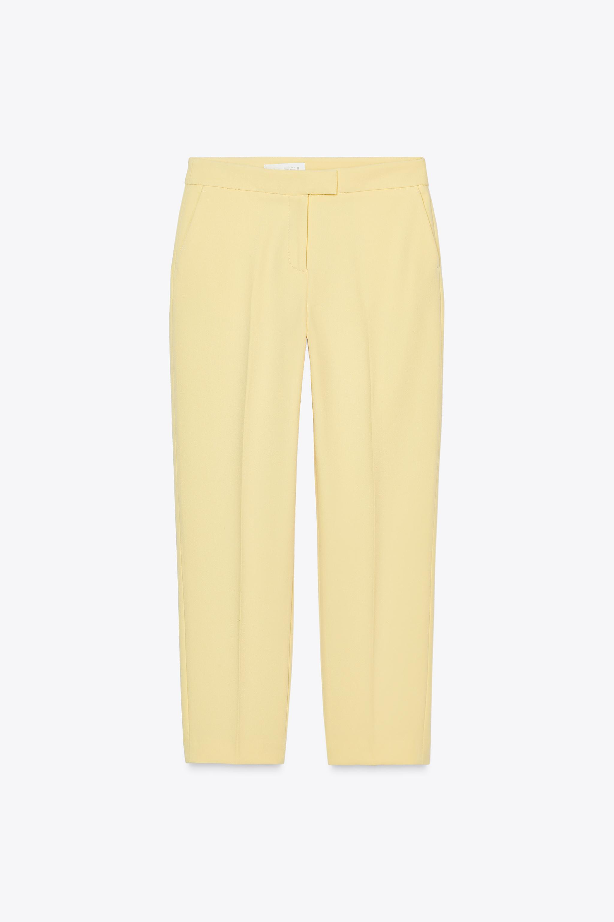 High-waisted slim pants with front pockets and back false welt pockets. Front zip, inside button,... | Zara US