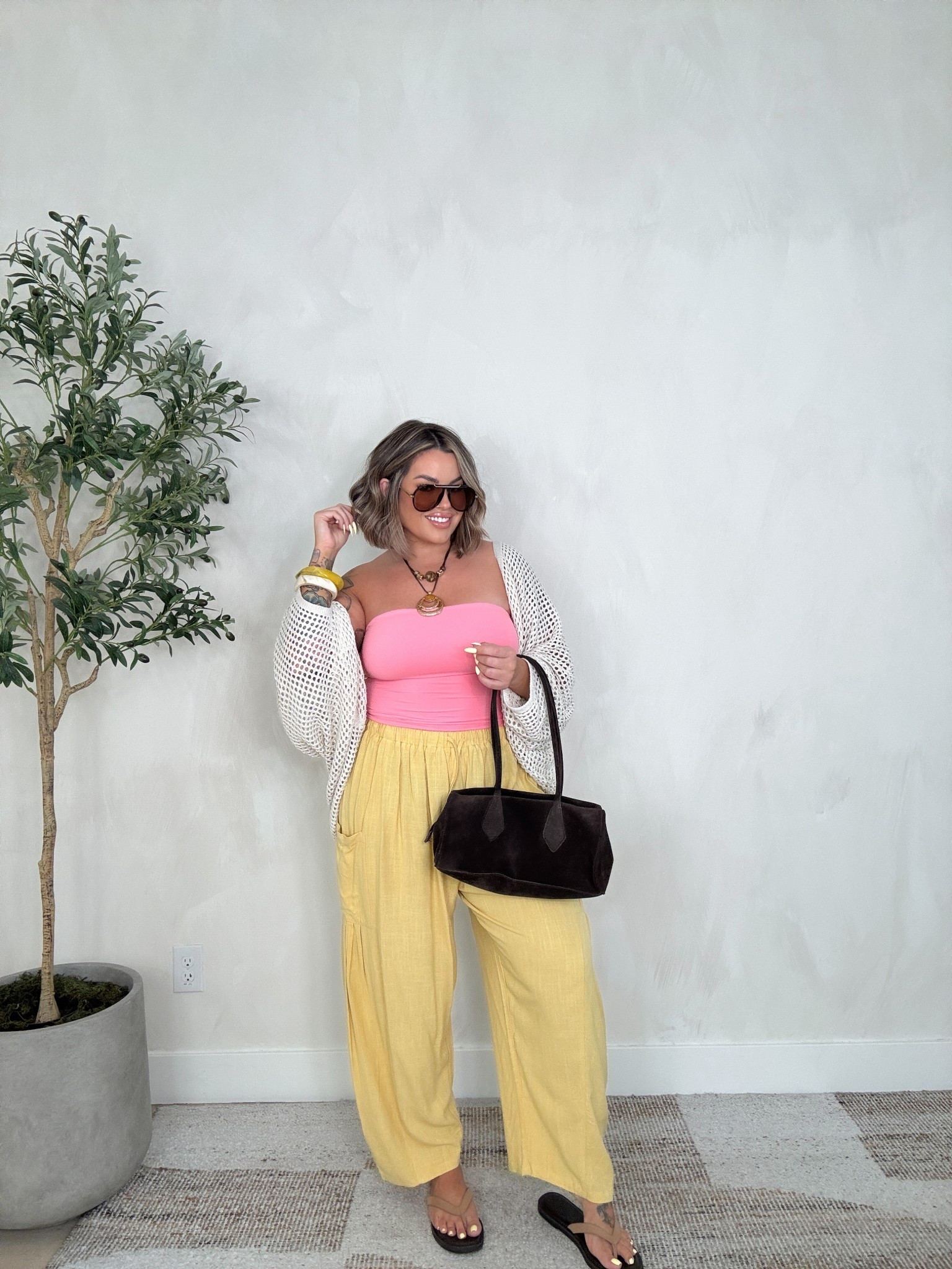 All size L , I’m using my cakes here but also linked a great bra option for this top as well. 
Pants fit very oversized same and the cover up could size down. 
Sandals tts 
