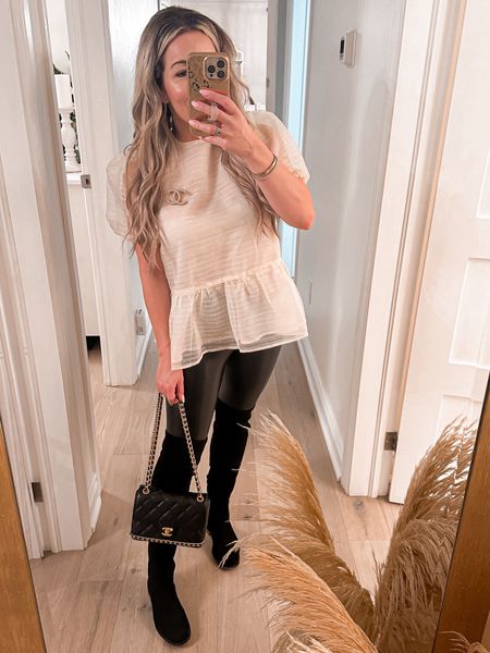Saturday night outfit. Ivory top. Ruffle top. Puffly sleeves top. Leather leggings. Black leather leggings. High knee boots. 

#LTKshoecrush #LTKitbag #LTKstyletip