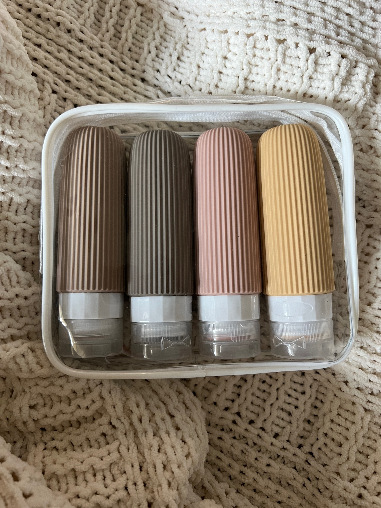 Great toiletry travel bottles in a TSA approved bag.

#LTKunder50 #LTKtravel