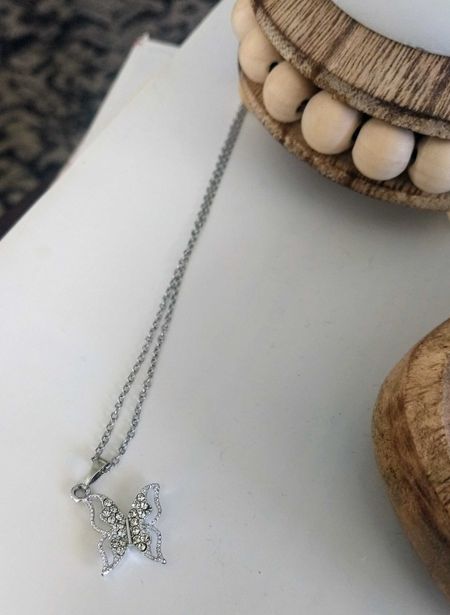 This dainty butterfly necklace is perfect for spring and under $10.

#LTKSeasonal #LTKfindsunder50 #LTKstyletip