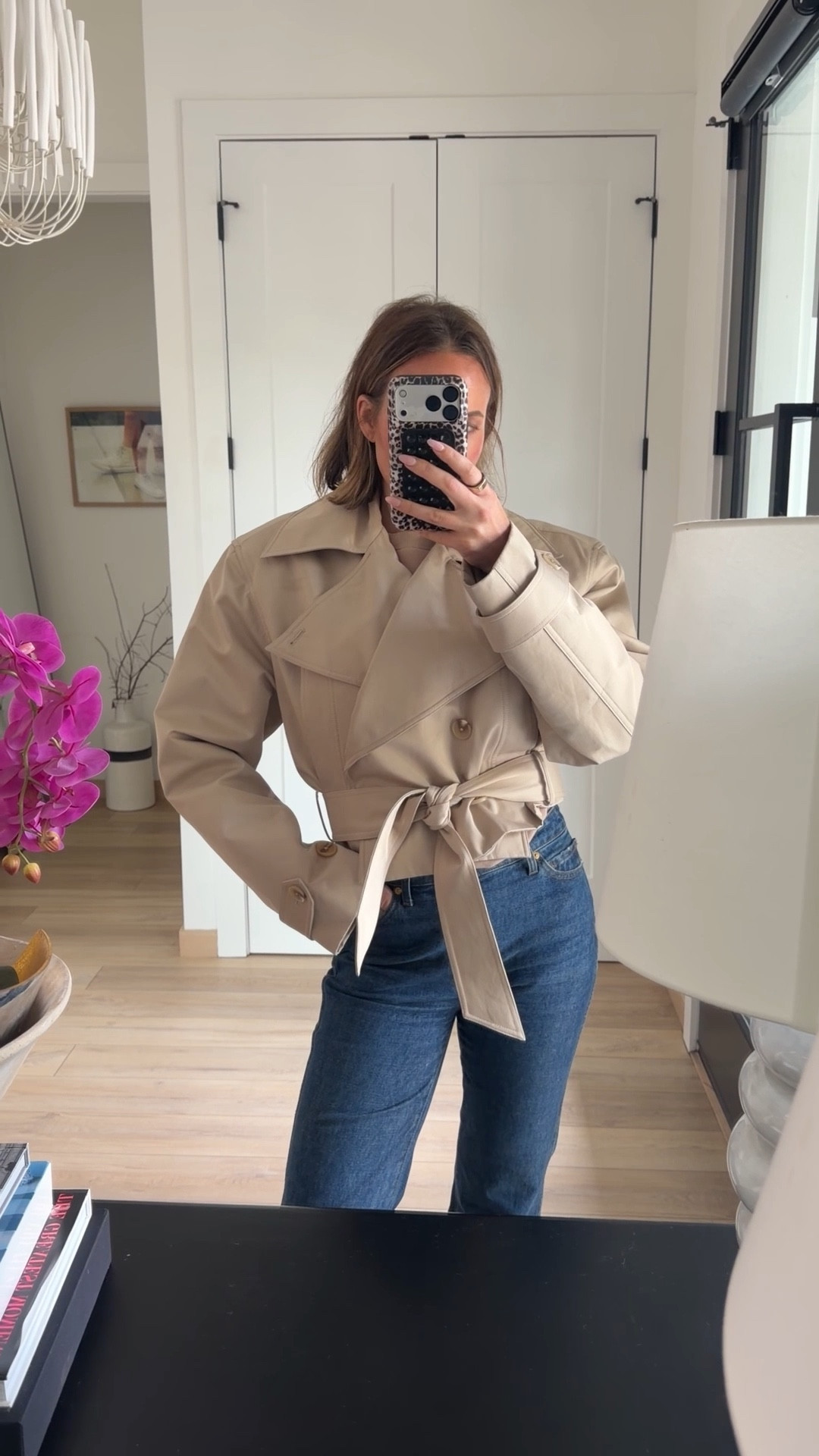 This is the only coat you need for the spring. It’s so chic. It has exaggerated shoulder pads and a tie at the waist
so it cinches you in. It’s so flattering. I’m wearing a small. Jeans run tts 

#LTKootd #LTKmomlife #LTKgrwm