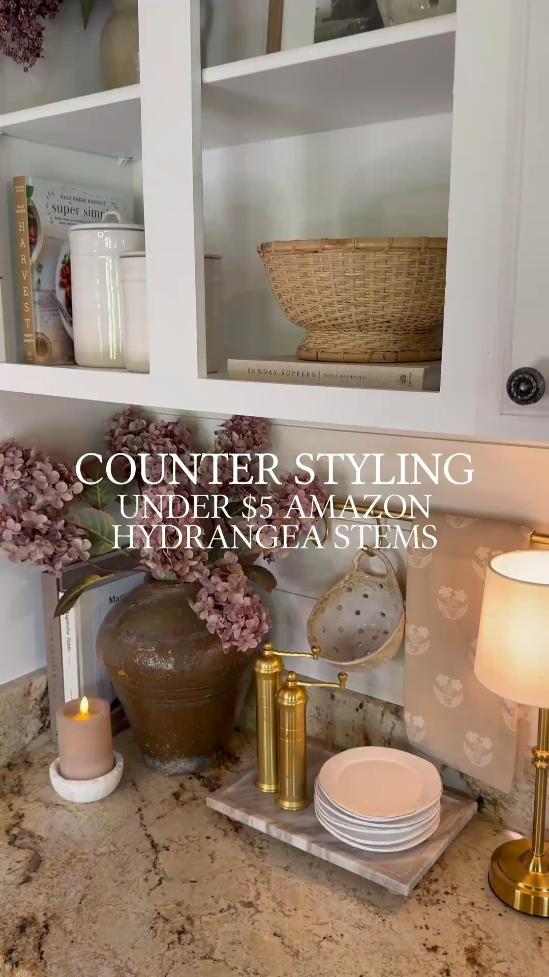 Viral Amazon Hydrangea Stems Under $5 🌿

These brown hydrangea stems are one of my favorite affordable Amazon decor finds right now. Over 300+ bought in the past month, and they instantly add warmth and softness to kitchen counters, coffee bars, shelving, and entryway styling. I styled 8 stems for this full, cozy designer-inspired look.

Follow @farmtotablecreations on Instagram for more home styling finds and inspiration.

#amazonhome #hydrangeastems #kitchendecor #countertopdecor #amazonfinds

amazon hydrangea stems | brown hydrangeas | kitchen counter styling | neutral kitchen decor | cozy kitchen ideas | faux hydrangeas | amazon home finds | kitchen styling ideas | designer inspired decor | brass accents | neutral home decor | countertop decor | coffee bar styling | affordable home decor | earthy decor | warm neutral decor | kitchen decor ideas | shelf styling | amazon decor finds | faux florals | elegant home styling | timeless decor | cottage kitchen decor | home decor inspiration | cozy home vibes

#LTKSaleAlert #LTKHome