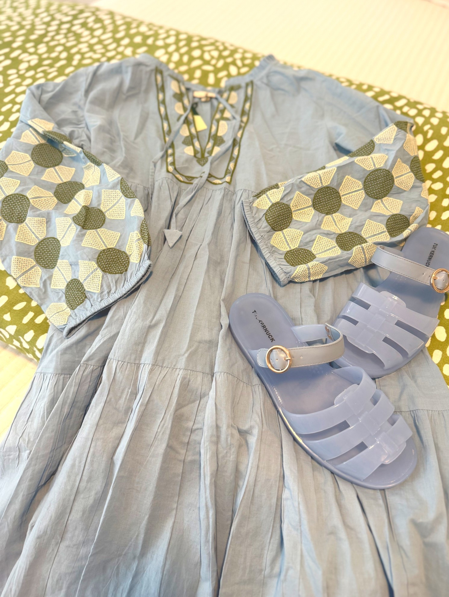 Ready for Mexico! These shoes are everything- pool side straight to dinner- easy to rinse off, secure on your feet, comes in a ton of color- glittery tan is my next purchase.  And this dress- my favorite color combo! 💙 💚.  Chest does run small of your larger in that area- size up.  
.
#resortwear #jellysandals #Tuckernuck 

#LTKdayinmylife #LTKmomlife #LTKMidsize