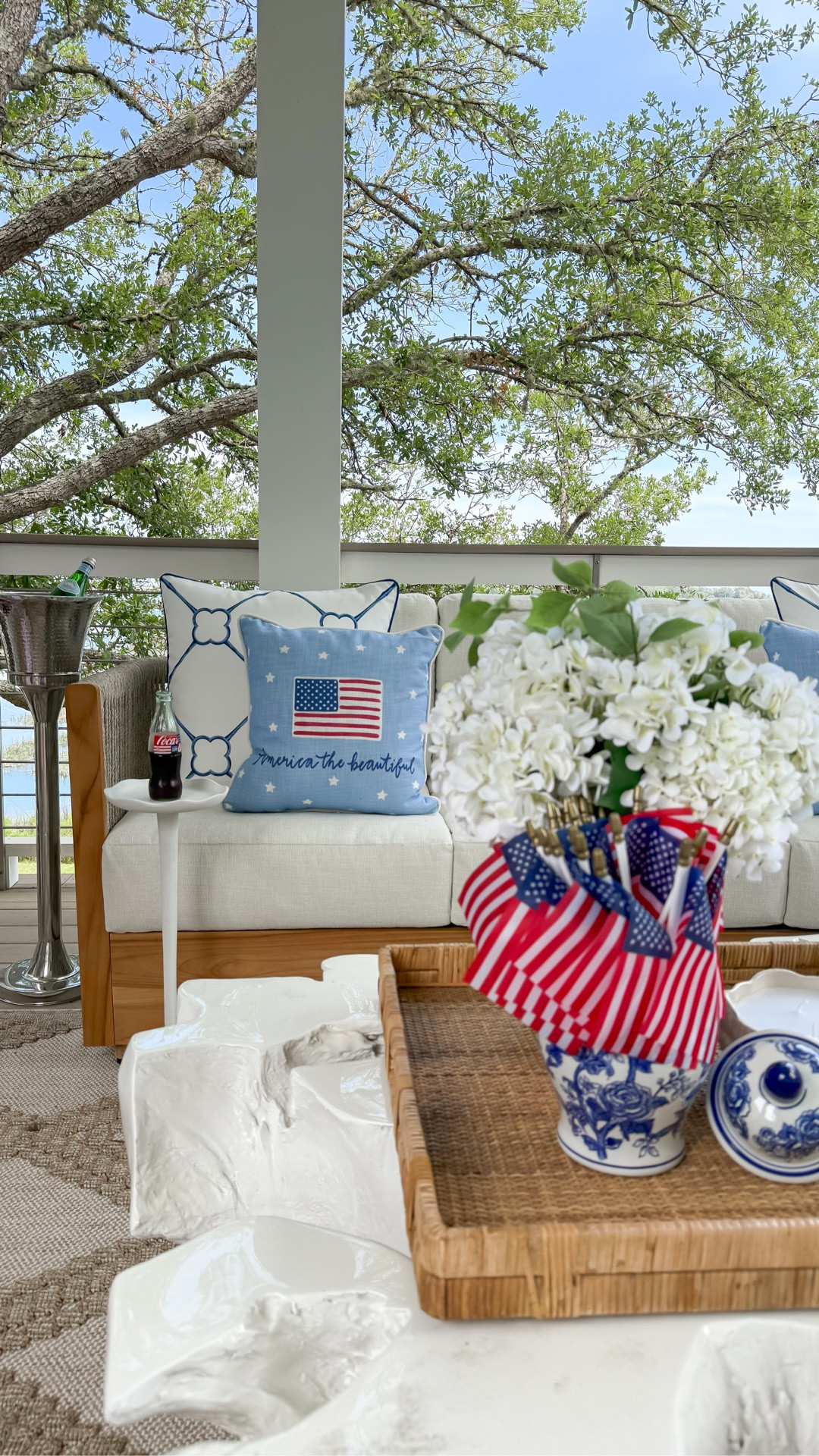 #ad Somewhere between Charleston, Cousins Beach, and Made in America… this porch happened. 🇺🇸✨

I wanted the porch to feel like the kind of summer you never forget - salty air, boat rides, country music playing somewhere in the distance, cold drinks, blue & white everything, and nights that somehow always last longer in the South.

A few @wayfair finds later and now I never want to go back inside. 🤍⚓️

Linked everything for my patriotic coastal summer porch. #WayfairPartner #Wayfair