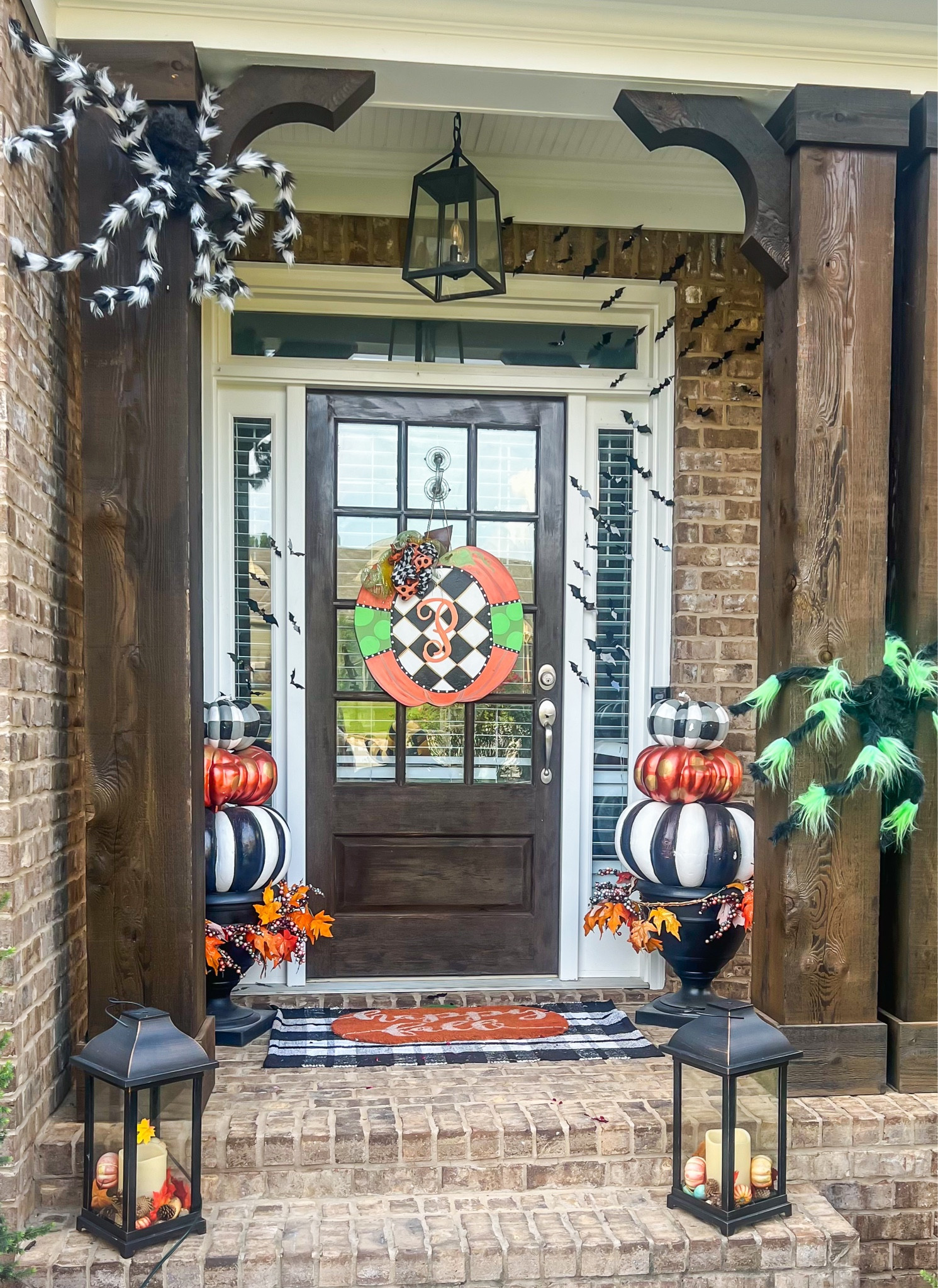 Halloween Porch Decor 
Halloween Outdoor Decor | Halloween Decor | Fall Decor 

I don’t have links for the pumpkin topiaries or the door hanger as I made both of those! 

#LTKSeasonal #LTKhome #LTKHalloween