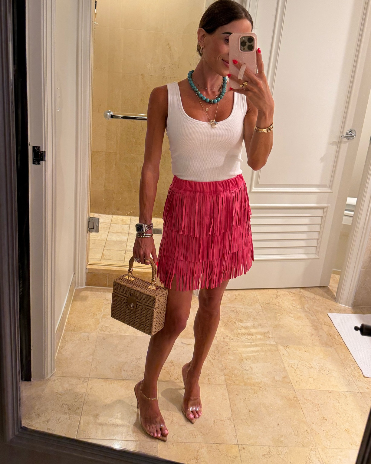 The cutest pink fringe skirt I have the kids L on. White tank with built in bra size xxs 
Vacation outfit

#LTKPetite #LTKTravel