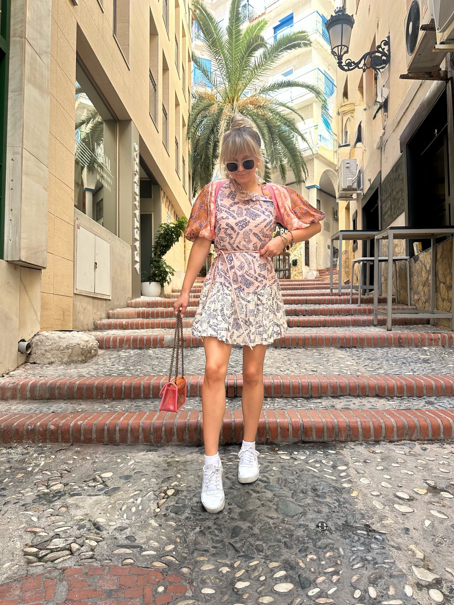 Conquering Benidorm one cobblestone at a time! Dressed like I just stepped out of a fashion fever dream – tiny bag, power sleeves, and enough patterns to give the pavement a run for its money. Tourists, take notes! Bring me back to the warm weather! ☀️

Ps, new blog post went live earlier today on www.cupsofcouture.com (link in bio) 

#LTKeurope #LTKstyletip #LTKsale