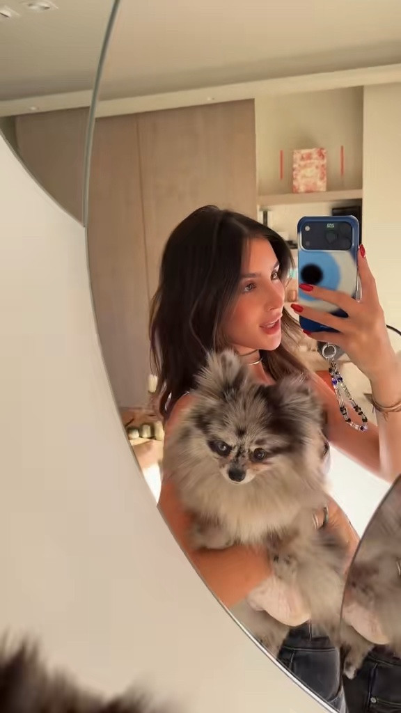 Outfit check featuring my favorite accessory, Mochi 🐺🤍 A sculpted grey halter with relaxed dark denim for the easiest cool-girl look. Everything is linked!

#LTKootd #LTKSeasonal #LTKdayinmylife