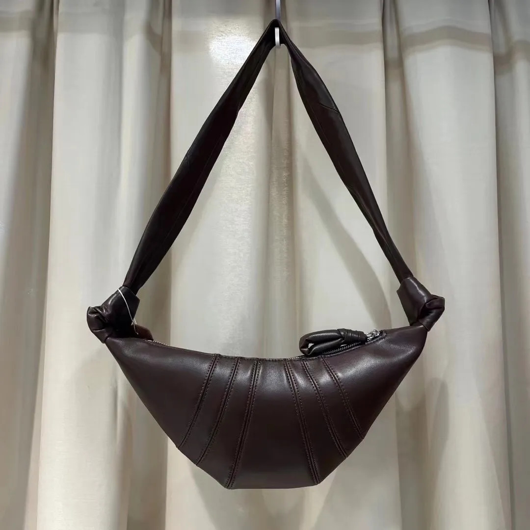 Cow horn bun designer bag shoulder leather crossbody can sing genuine dumpling sheepskin | DHGate